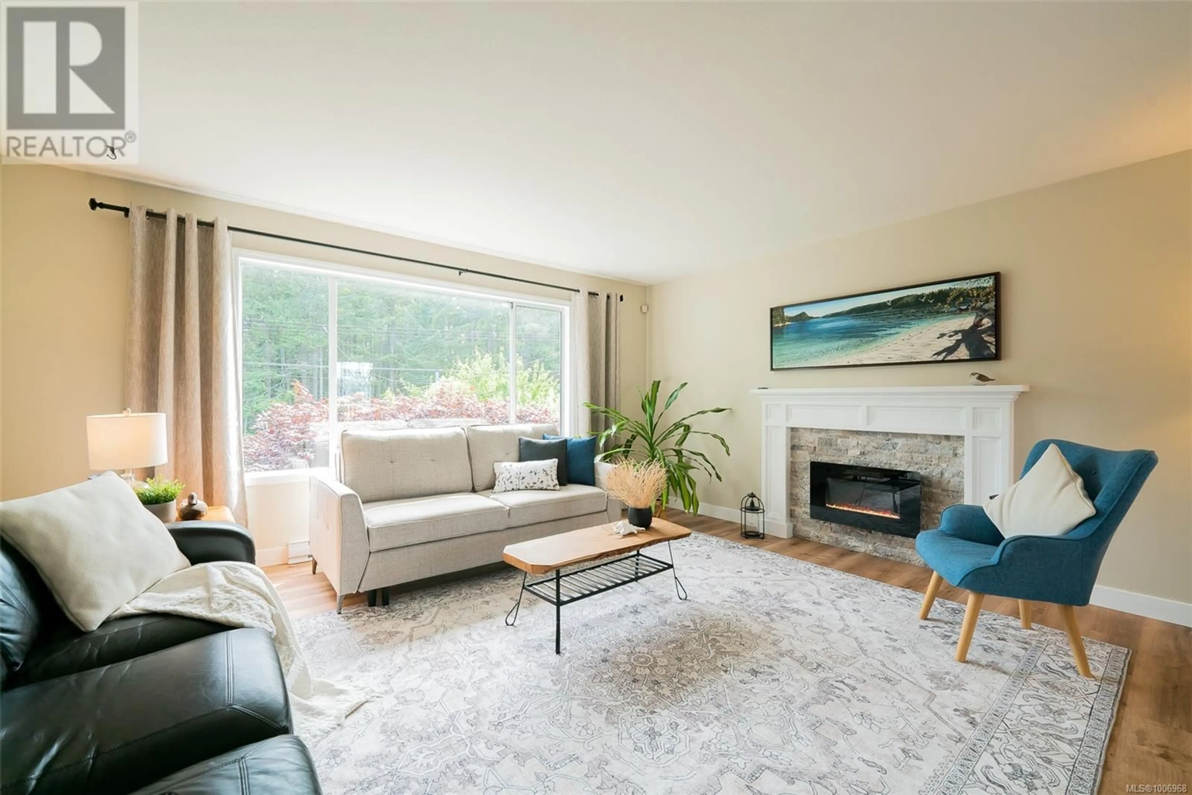 Living room with furniture, unknown for 4862 LOST LAKE ROAD, Nanaimo British Columbia V9T5C8