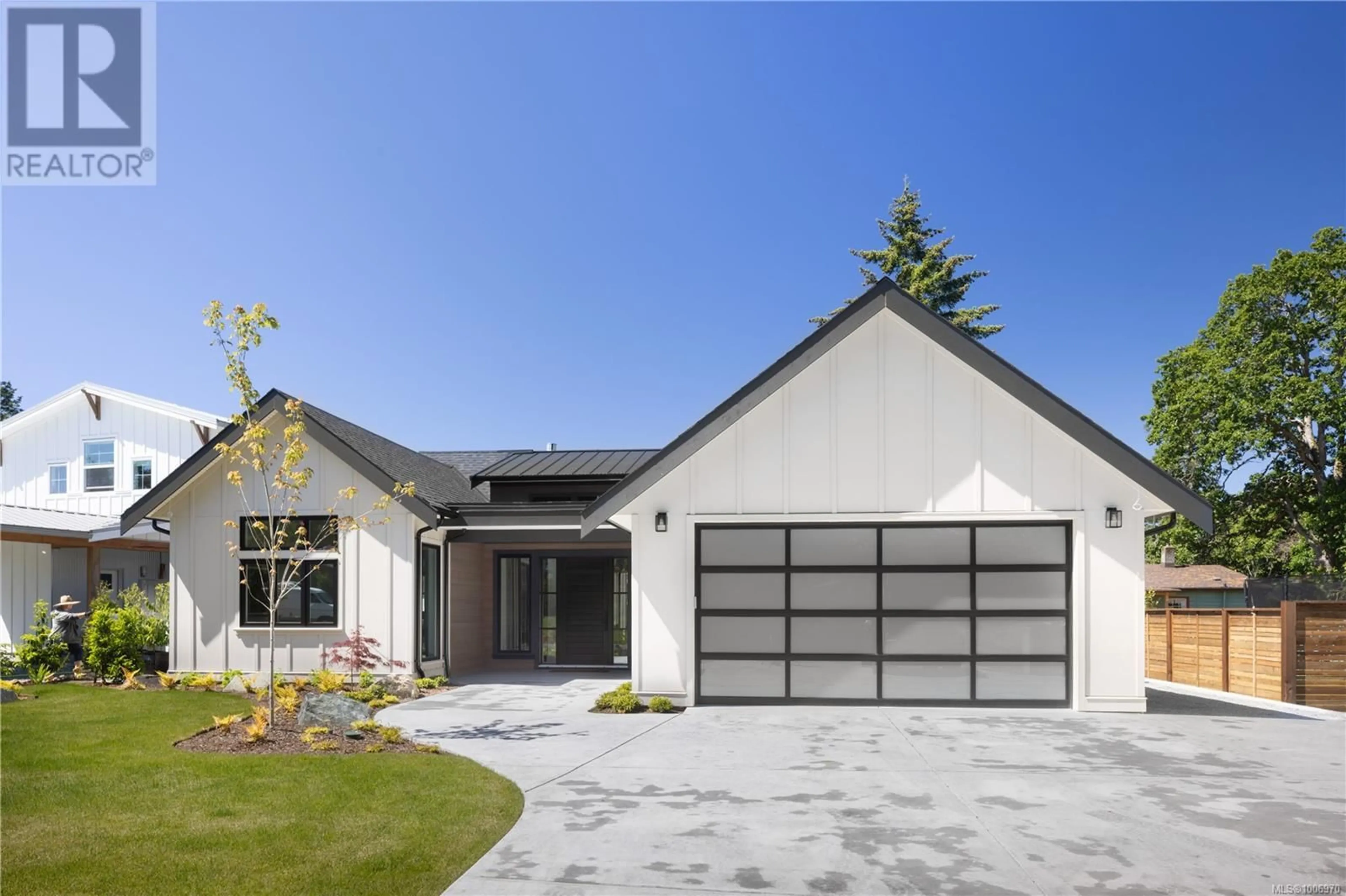 Home with vinyl exterior material, street for 10210 TSAYKUM ROAD, North Saanich British Columbia V8L5T6