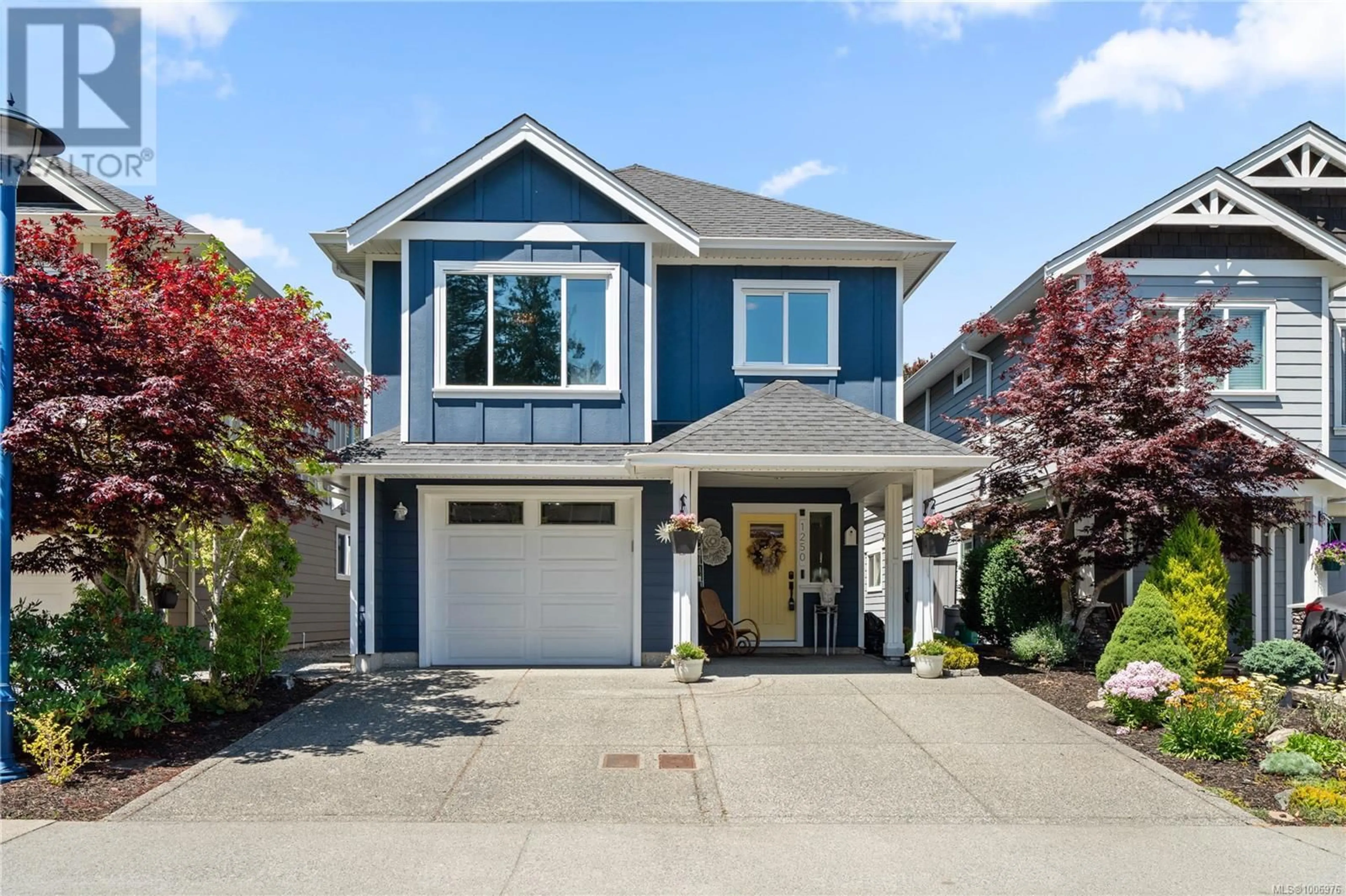 Home with vinyl exterior material, street for 1250 PARKDALE CREEK GARDENS, Langford British Columbia V9B4G9