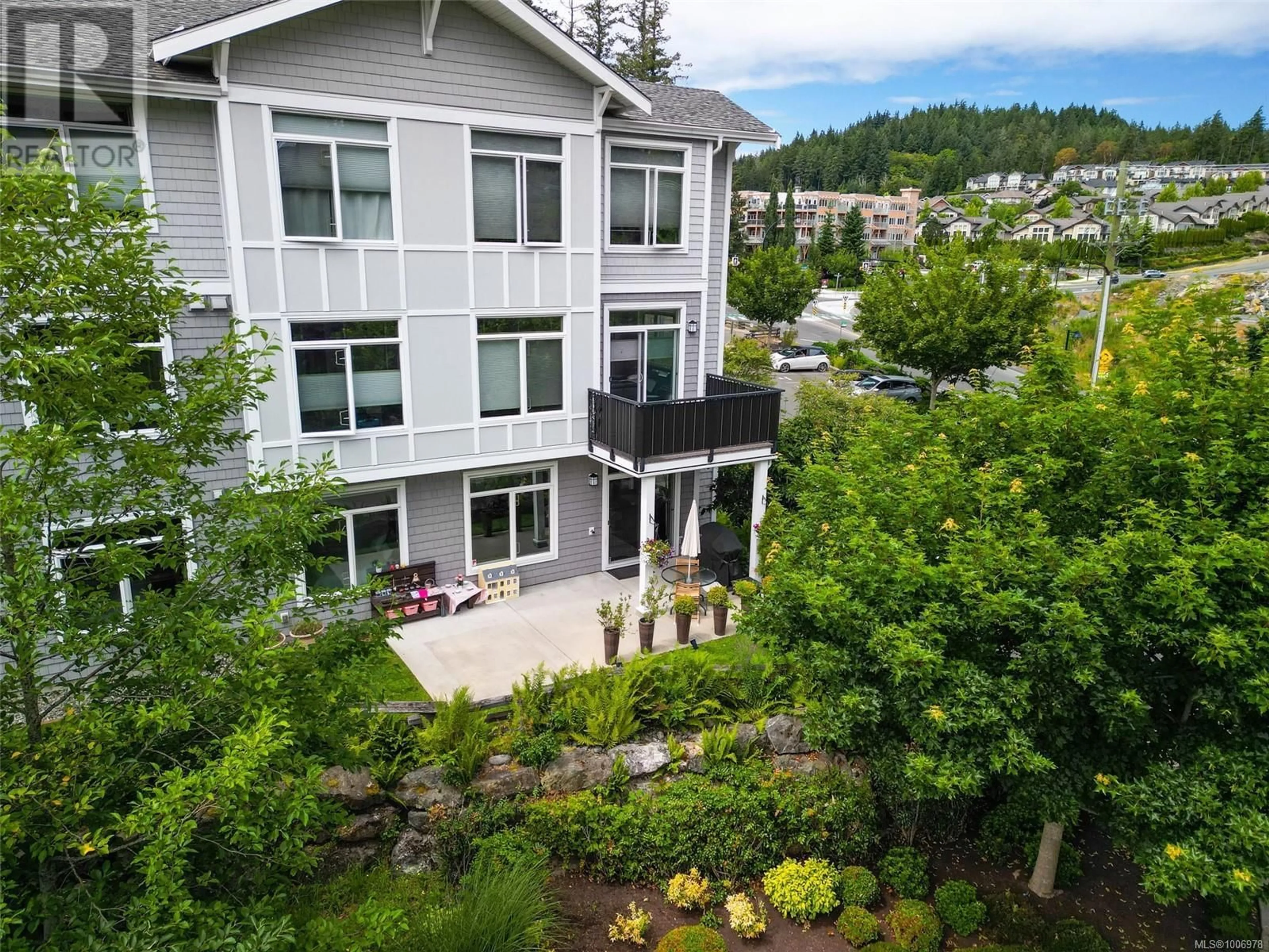 A pic from outside/outdoor area/front of a property/back of a property/a pic from drone, mountain view for 101 - 591 LATORIA ROAD, Colwood British Columbia V9C2Z9