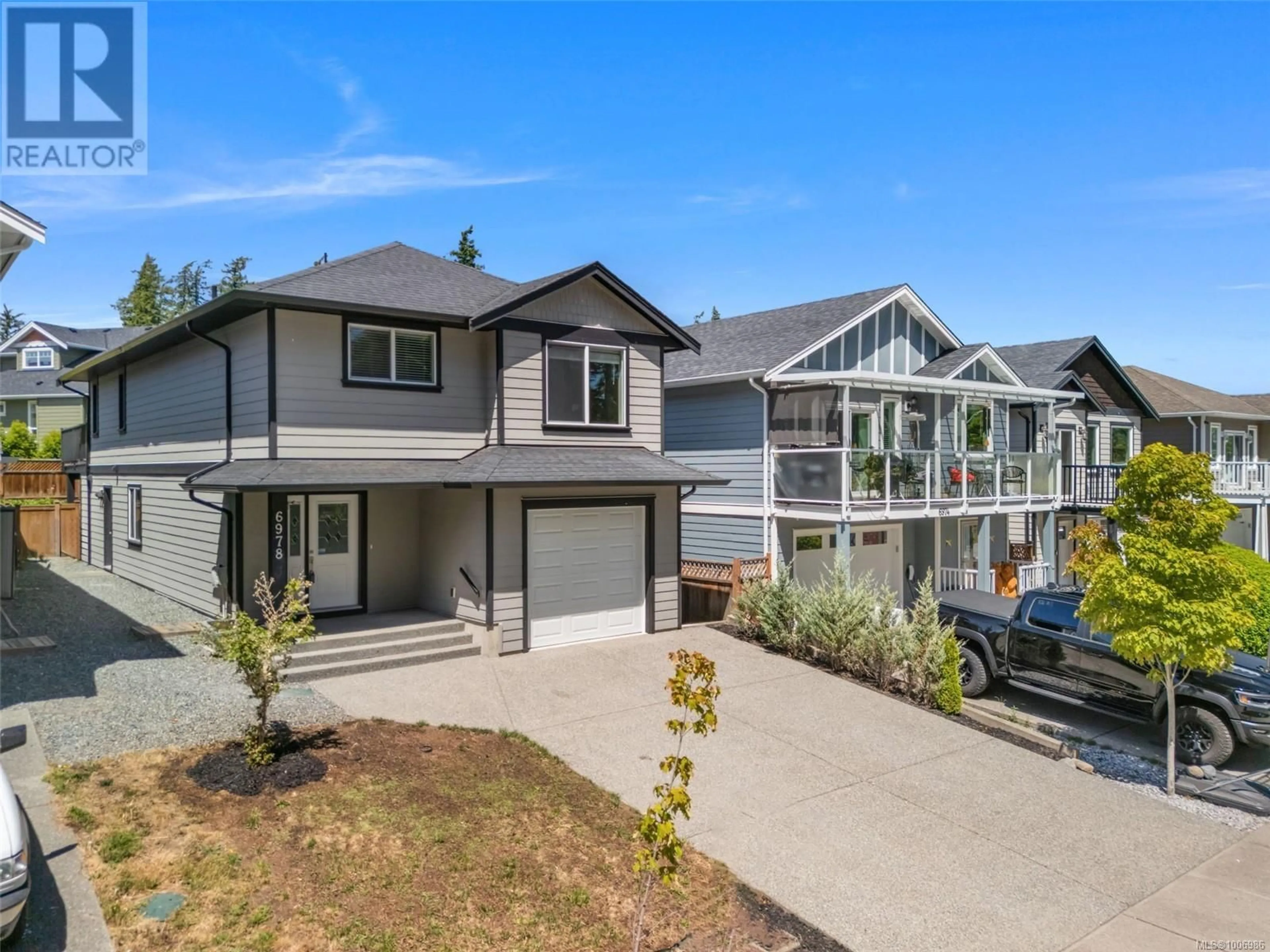 Home with vinyl exterior material, street for 6978 WRIGHT ROAD, Sooke British Columbia V9Z1M5