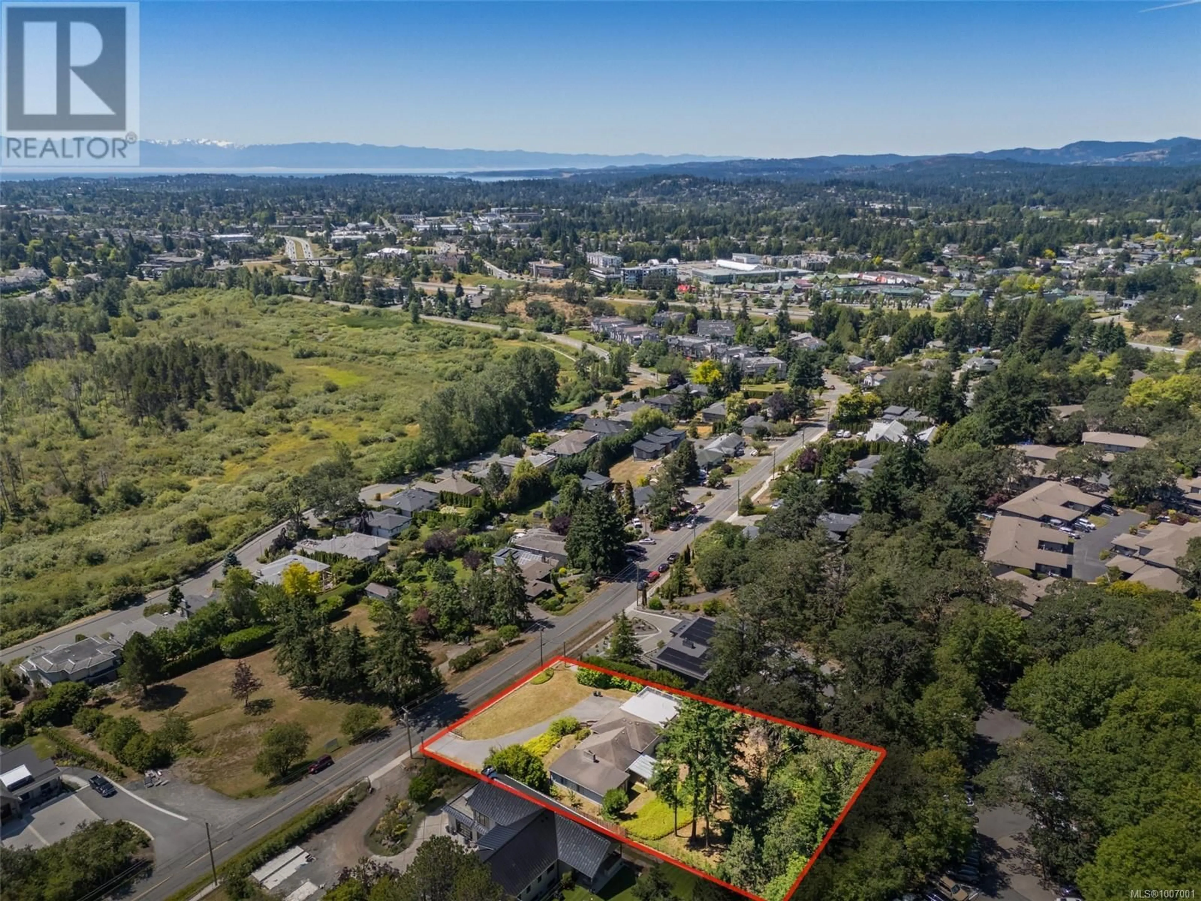A pic from outside/outdoor area/front of a property/back of a property/a pic from drone, mountain view for 854 ROYAL OAK AVENUE, Saanich British Columbia V8X3T2