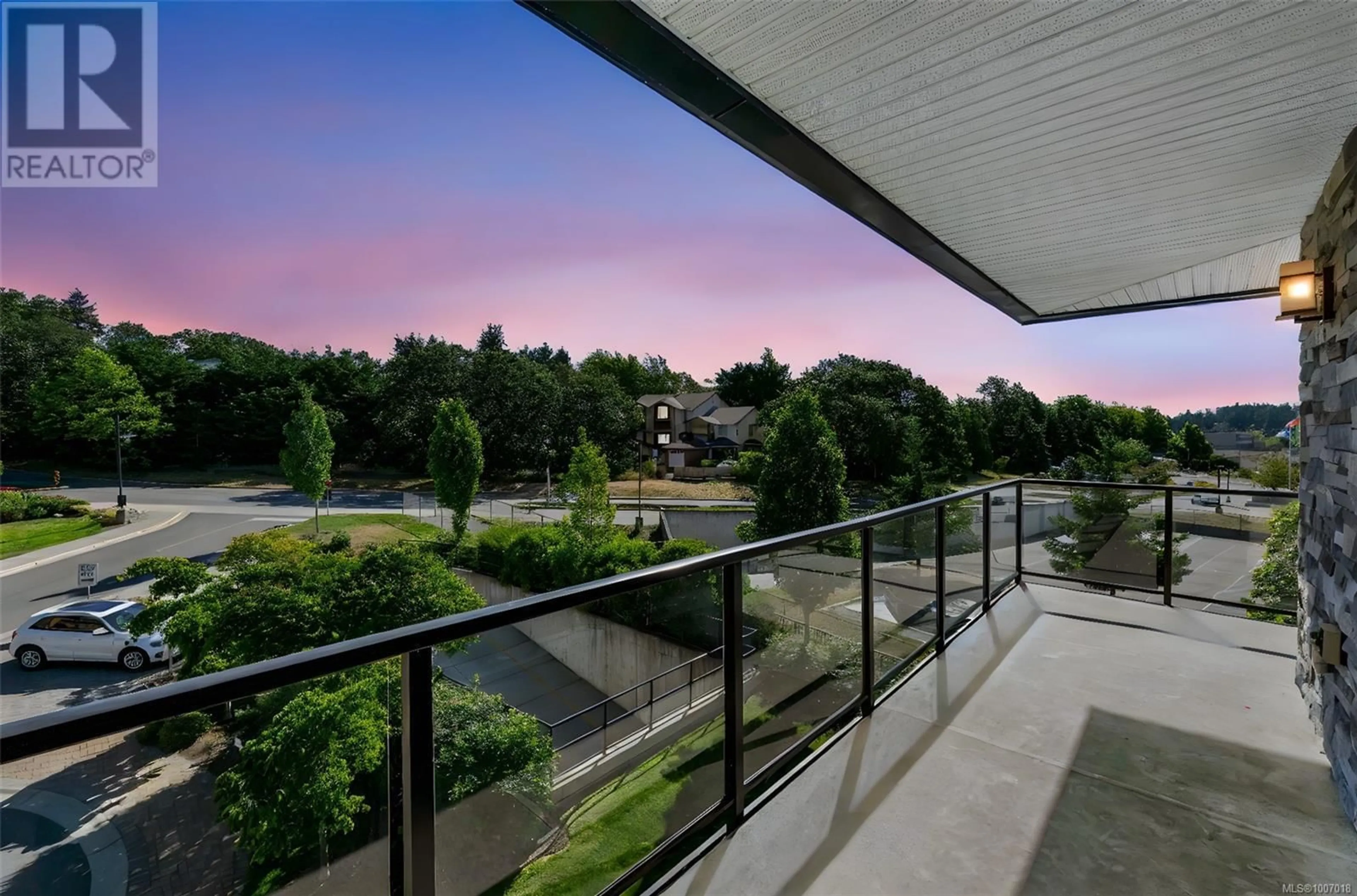 Balcony in the apartment, city buildings view from balcony for 302 - 747 TRAVINO LANE, Saanich British Columbia V8Z0E4