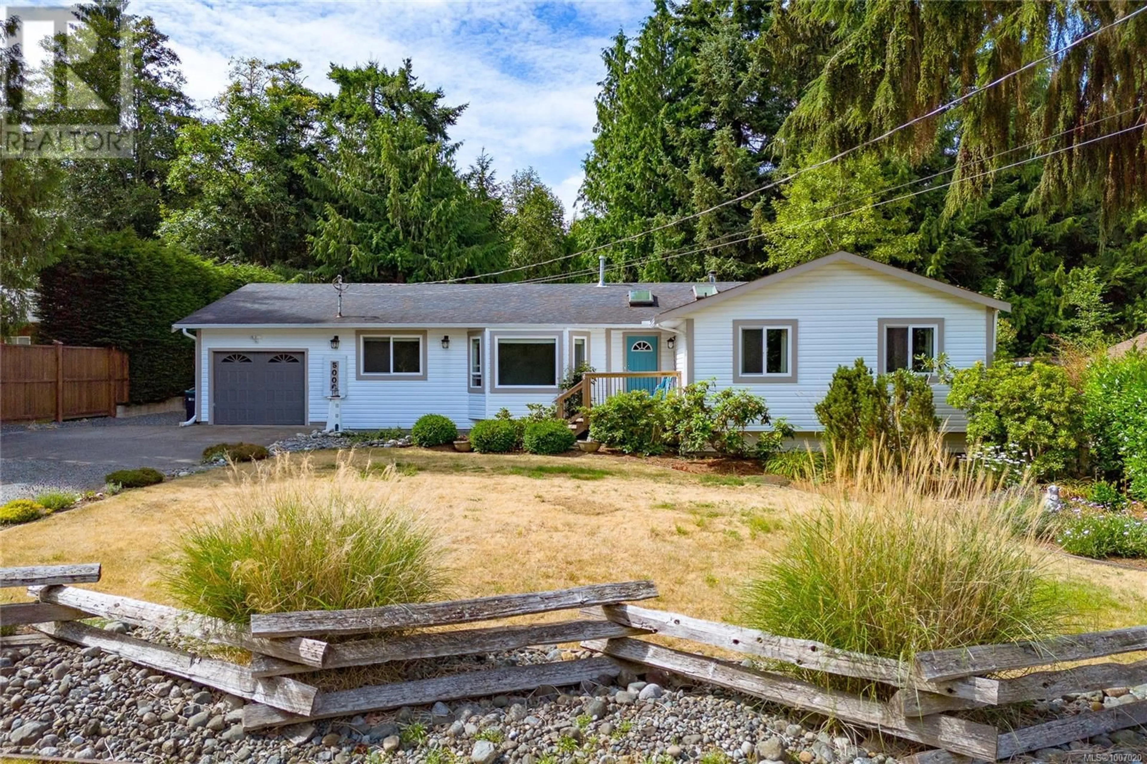 Home with vinyl exterior material, street for 5006 THOMPSON CLARKE DRIVE WEST, Bowser British Columbia V0R1G0
