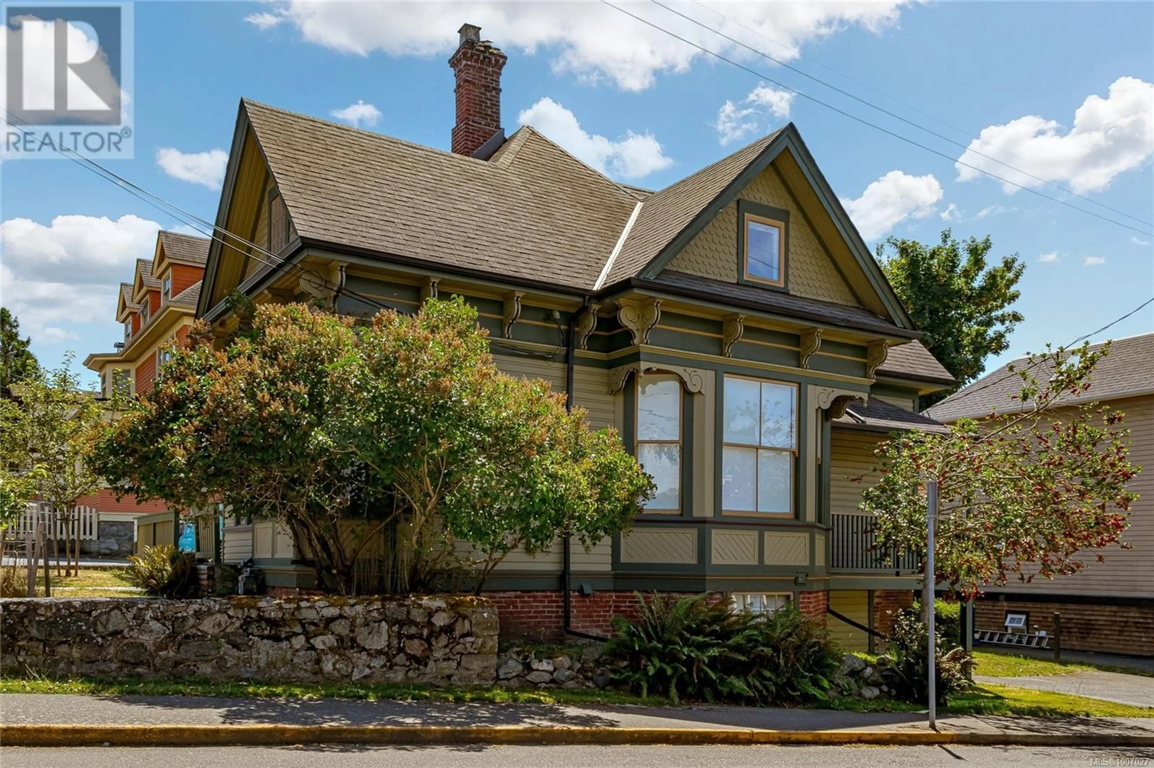 Home with brick exterior material, street for 1422 FERNWOOD ROAD, Victoria British Columbia V8V4P7