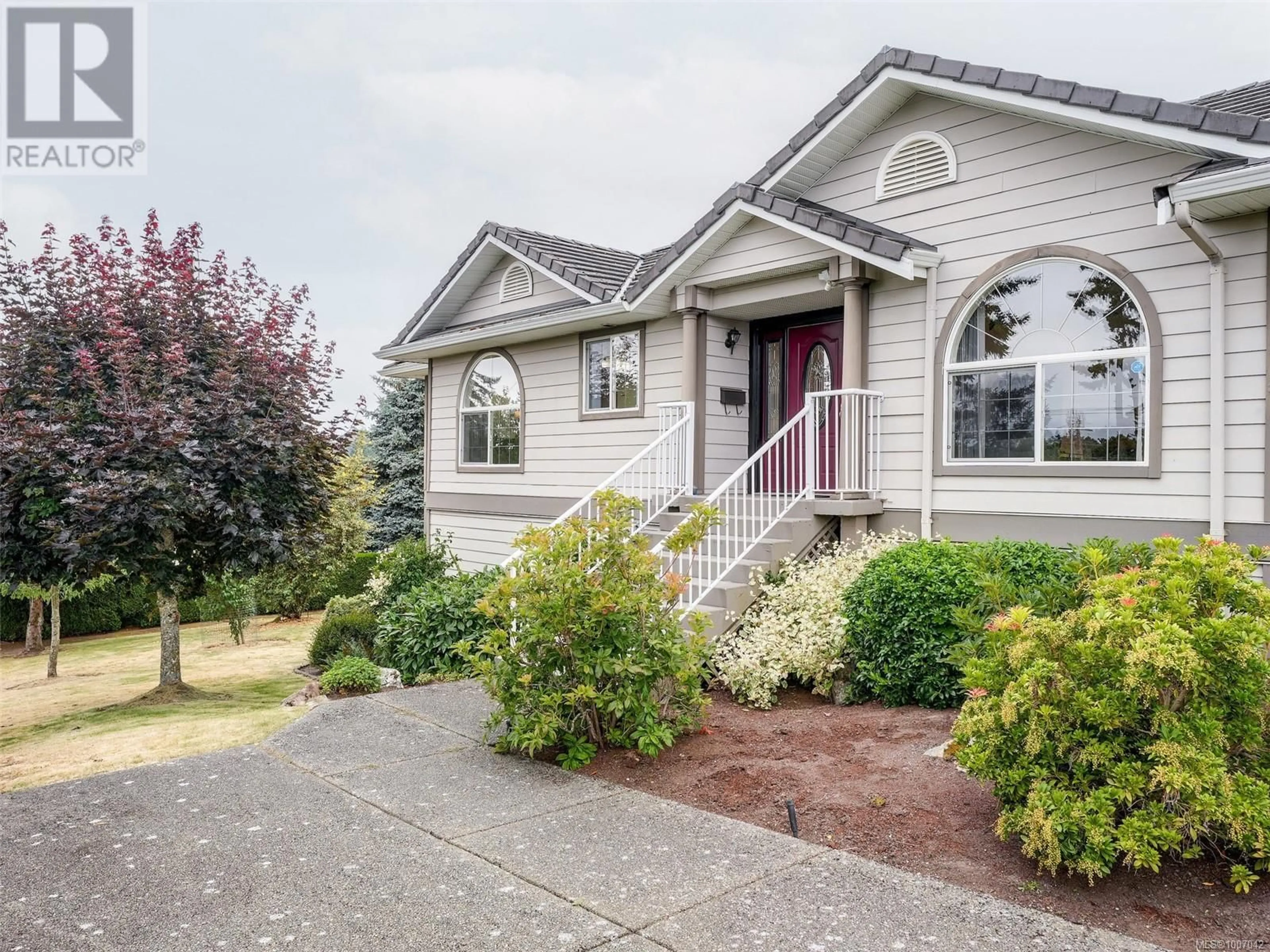 Home with vinyl exterior material, street for 2340 WATKISS WAY, View Royal British Columbia V9B6C9