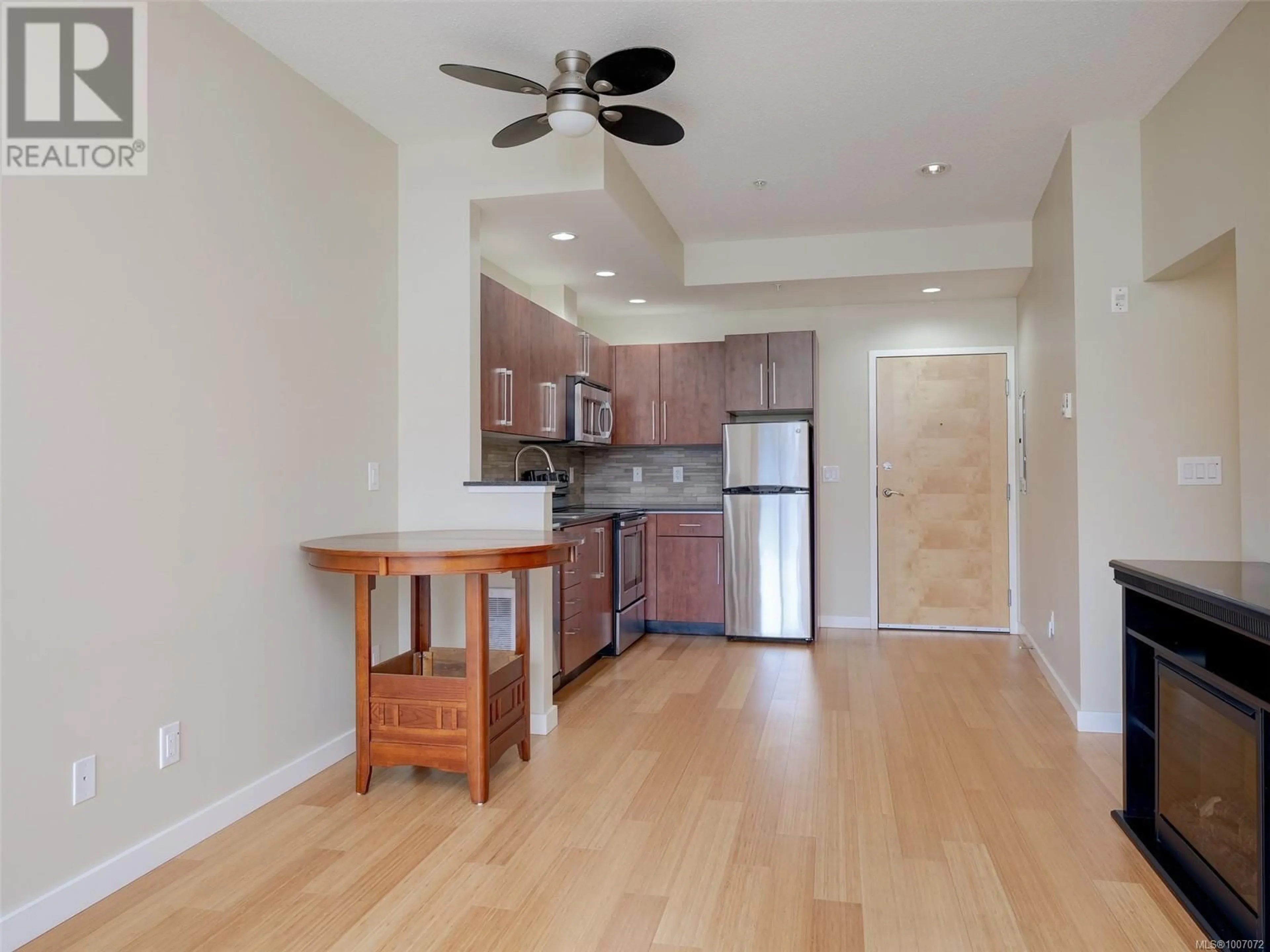 Open concept kitchen, wood/laminate floor for 307 - 611 BROOKSIDE ROAD, Colwood British Columbia V9C0C3