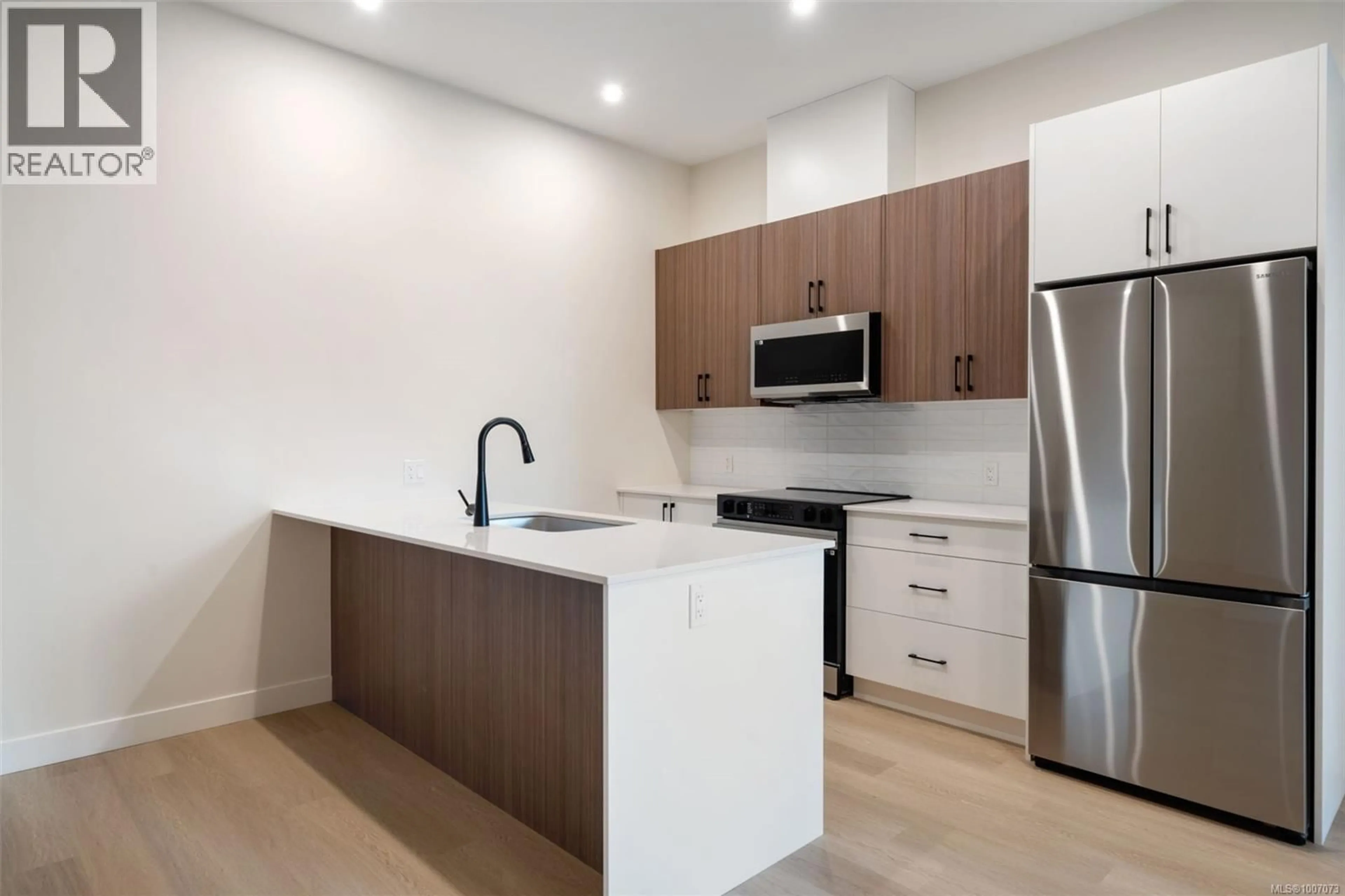 Standard kitchen, wood/laminate floor for 506 - 2770 WINSTER ROAD, Langford British Columbia V9B7C7