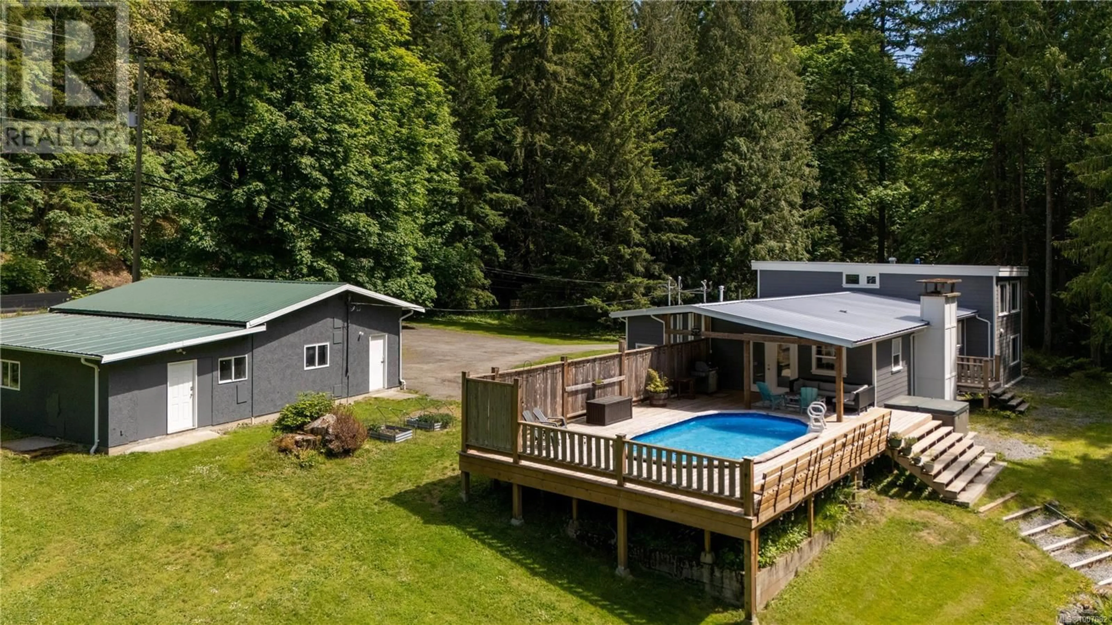 A pic from outside/outdoor area/front of a property/back of a property/a pic from drone, water/lake/river/ocean view for 1885 VERLON ROAD, Shawnigan Lake British Columbia V0R2W5