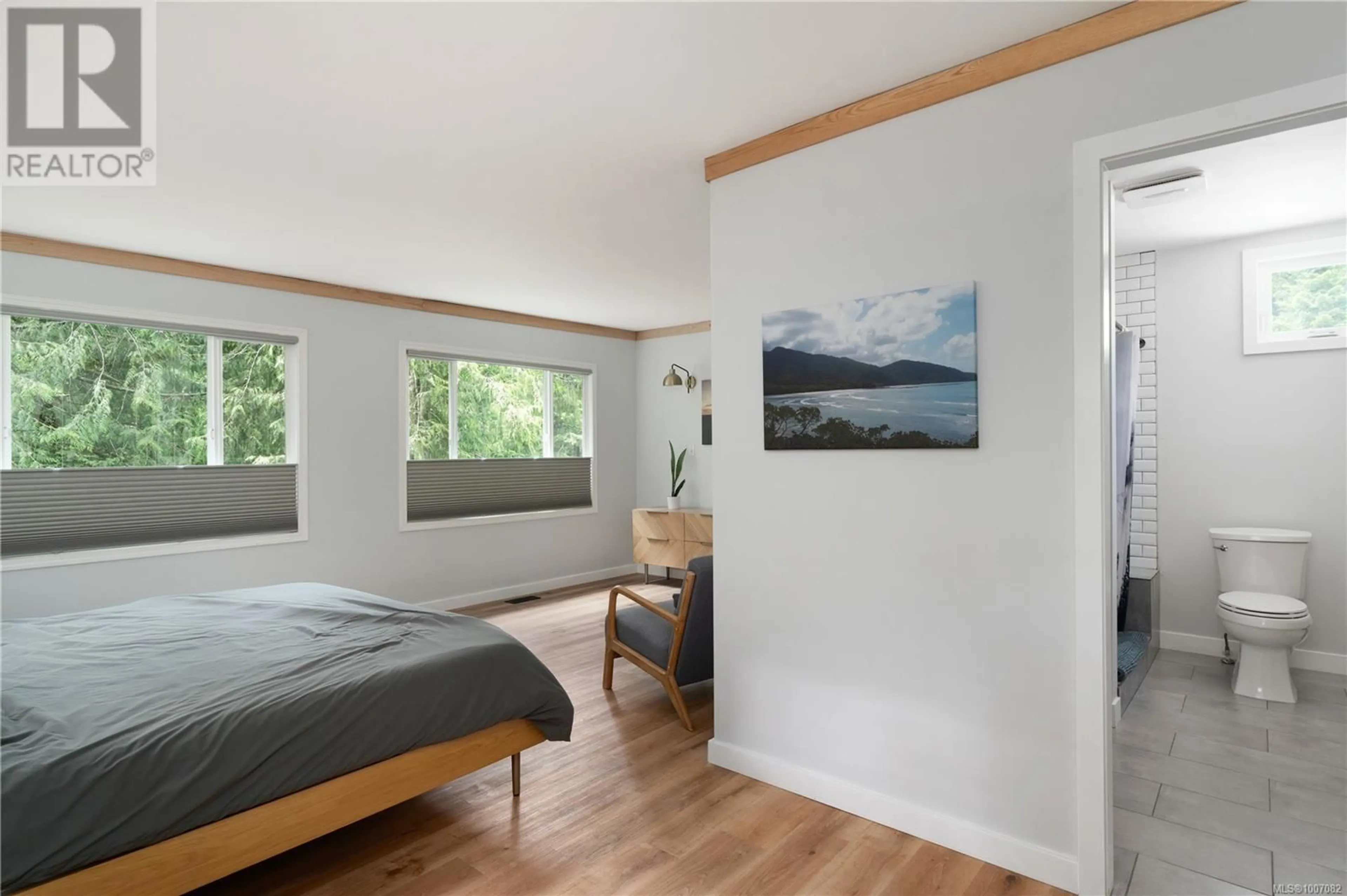 Bedroom with bed, wood/laminate floor for 1885 VERLON ROAD, Shawnigan Lake British Columbia V0R2W5