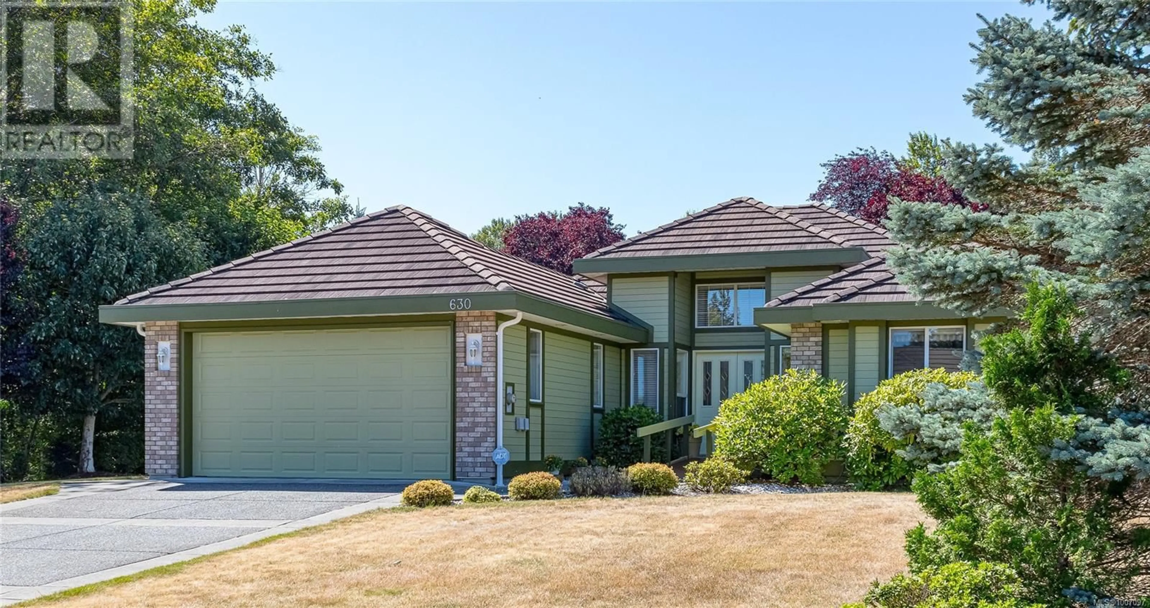 Home with brick exterior material, street for 630 MORNINGSTAR DRIVE, Parksville British Columbia V9P2W2