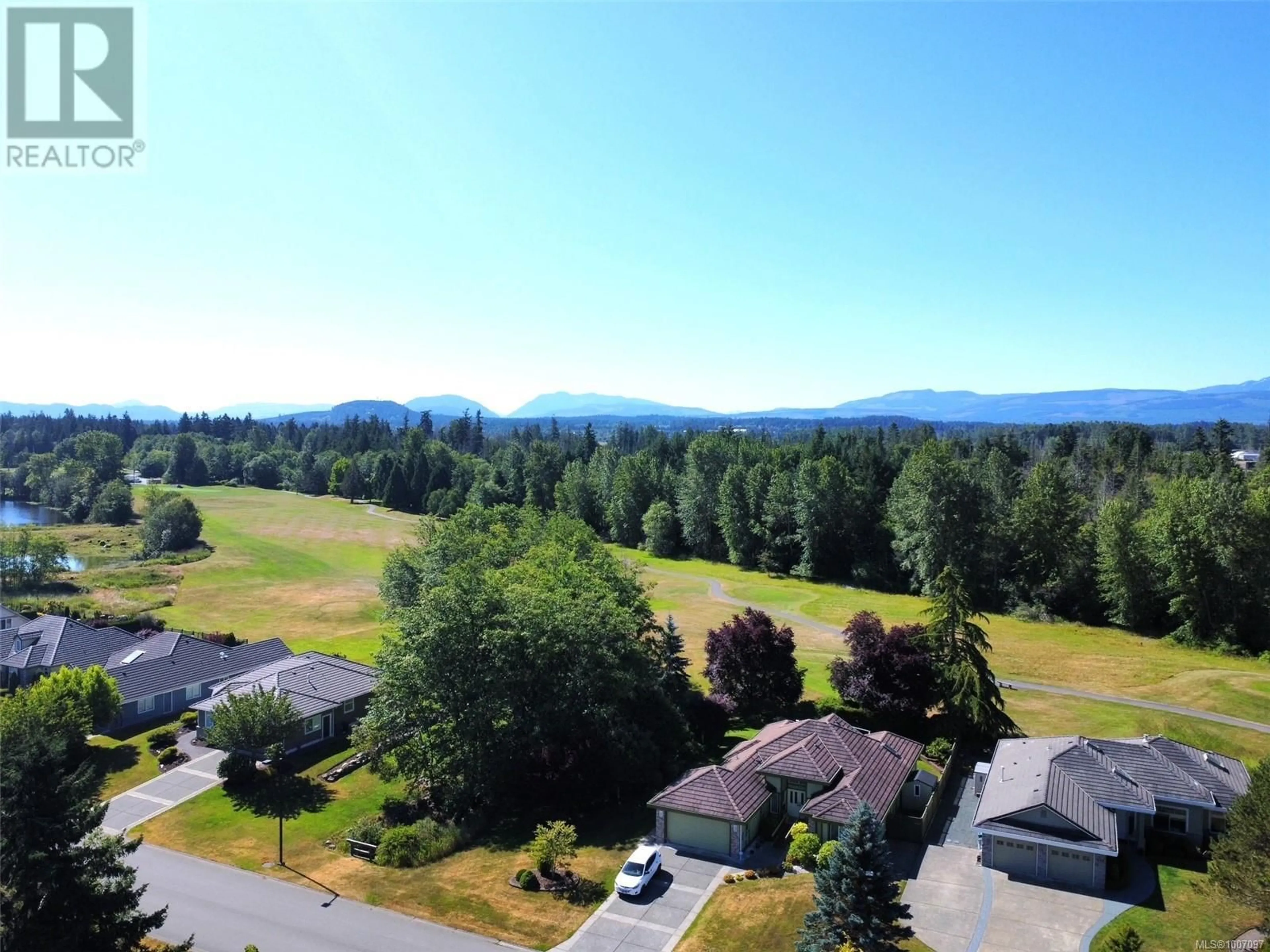 A pic from outside/outdoor area/front of a property/back of a property/a pic from drone, mountain view for 630 MORNINGSTAR DRIVE, Parksville British Columbia V9P2W2