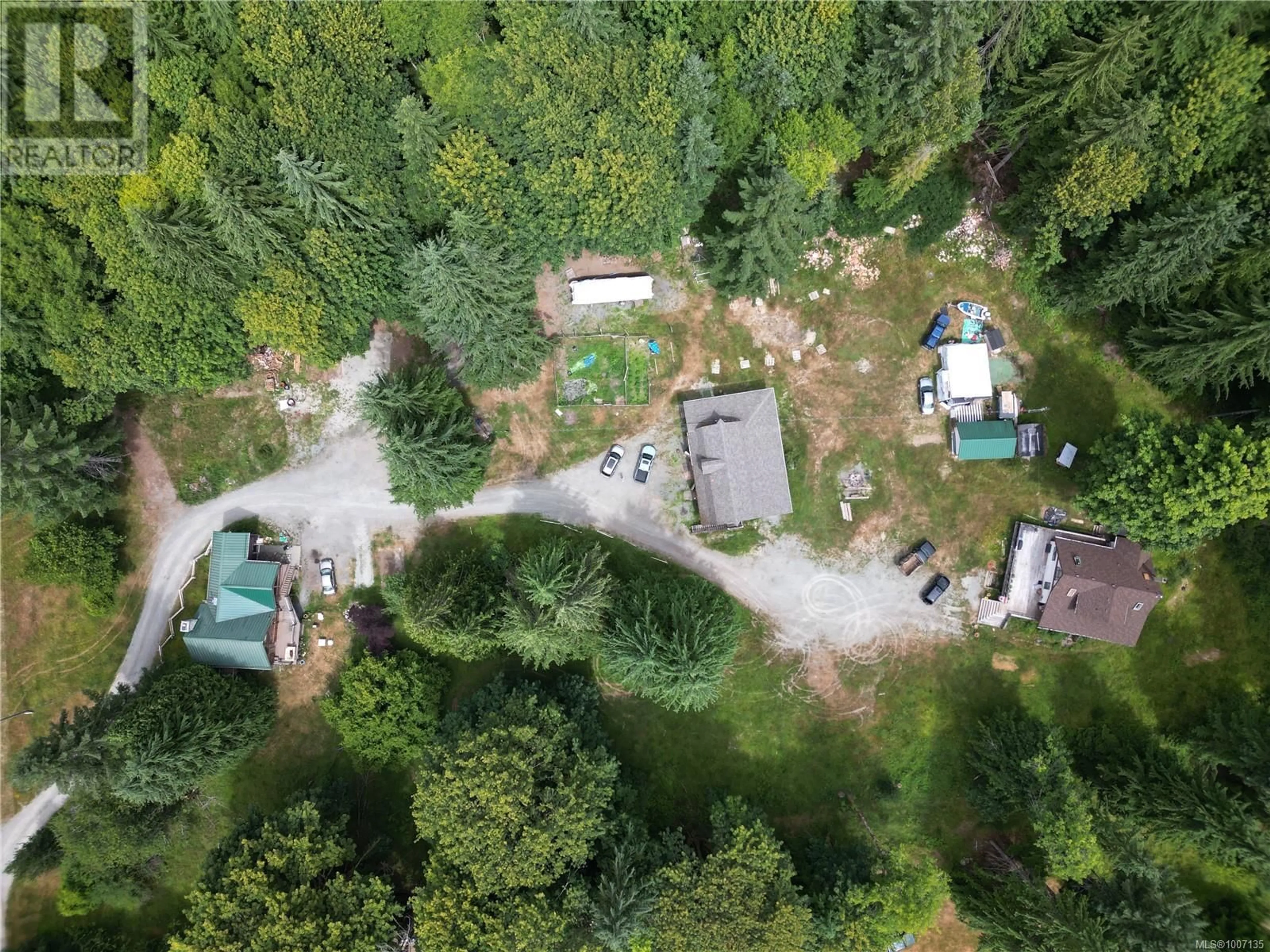 A pic from outside/outdoor area/front of a property/back of a property/a pic from drone, forest/trees view for 7421 NANTREE ROAD, Lake Cowichan British Columbia V0R2G0