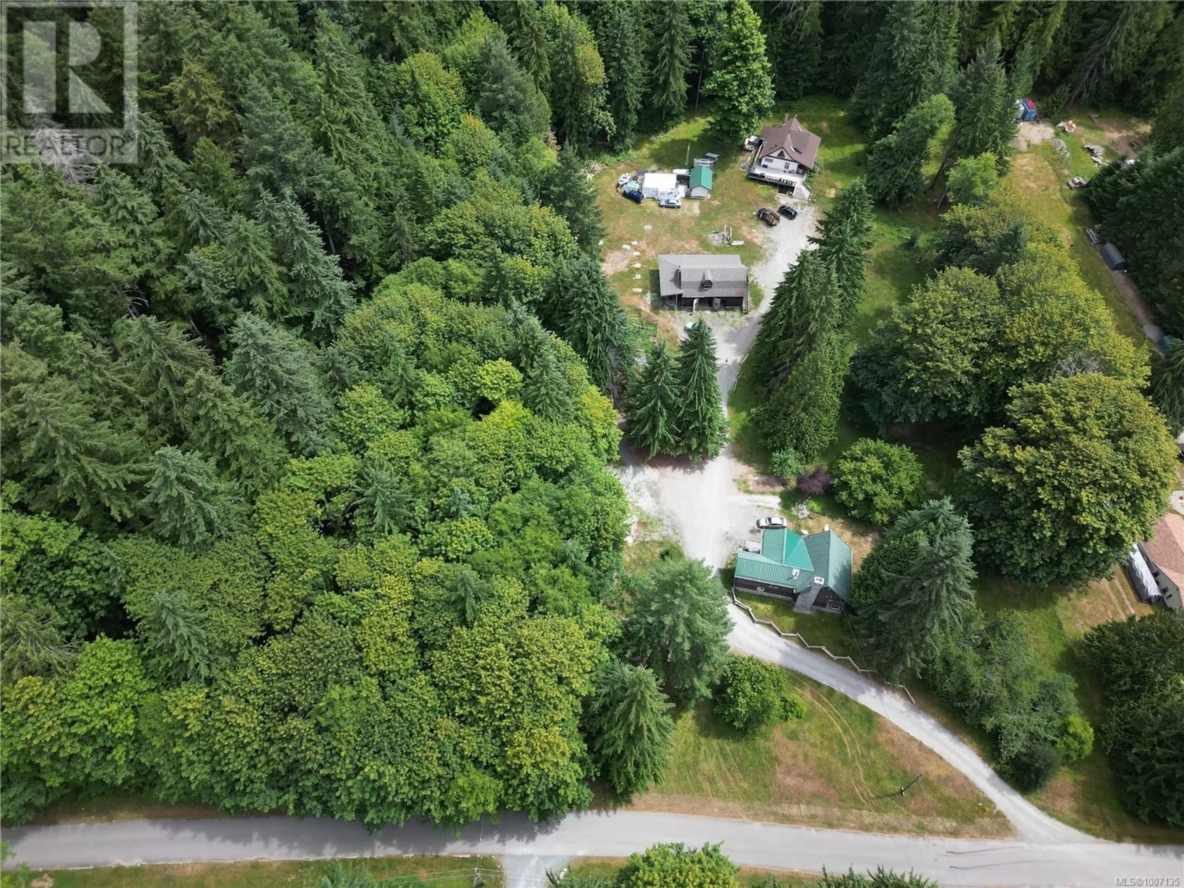A pic from outside/outdoor area/front of a property/back of a property/a pic from drone, forest/trees view for 7421 NANTREE ROAD, Lake Cowichan British Columbia V0R2G0