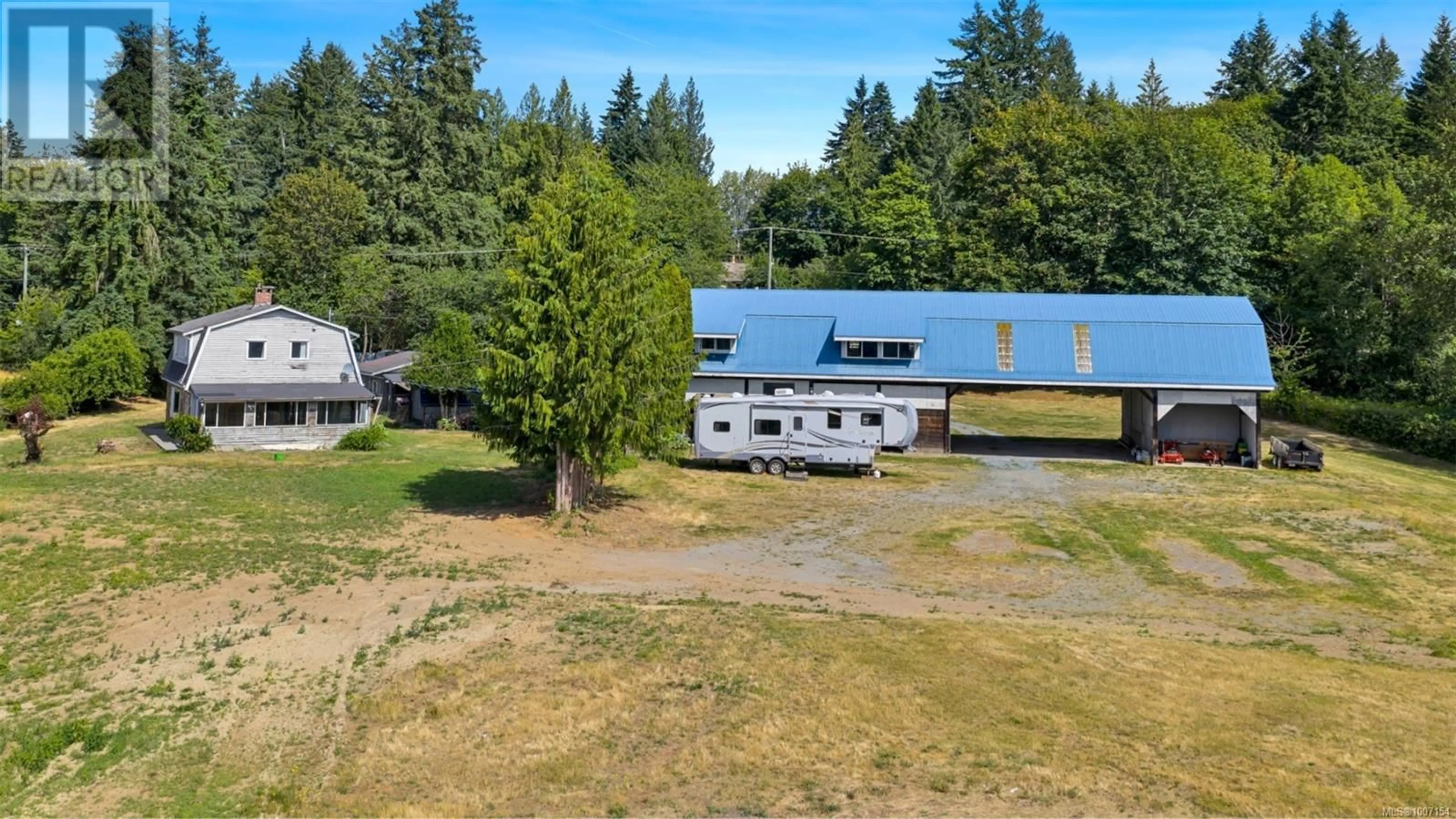 A pic from outside/outdoor area/front of a property/back of a property/a pic from drone, building for 4270 COWICHAN LAKE ROAD, Duncan British Columbia V9L6H2