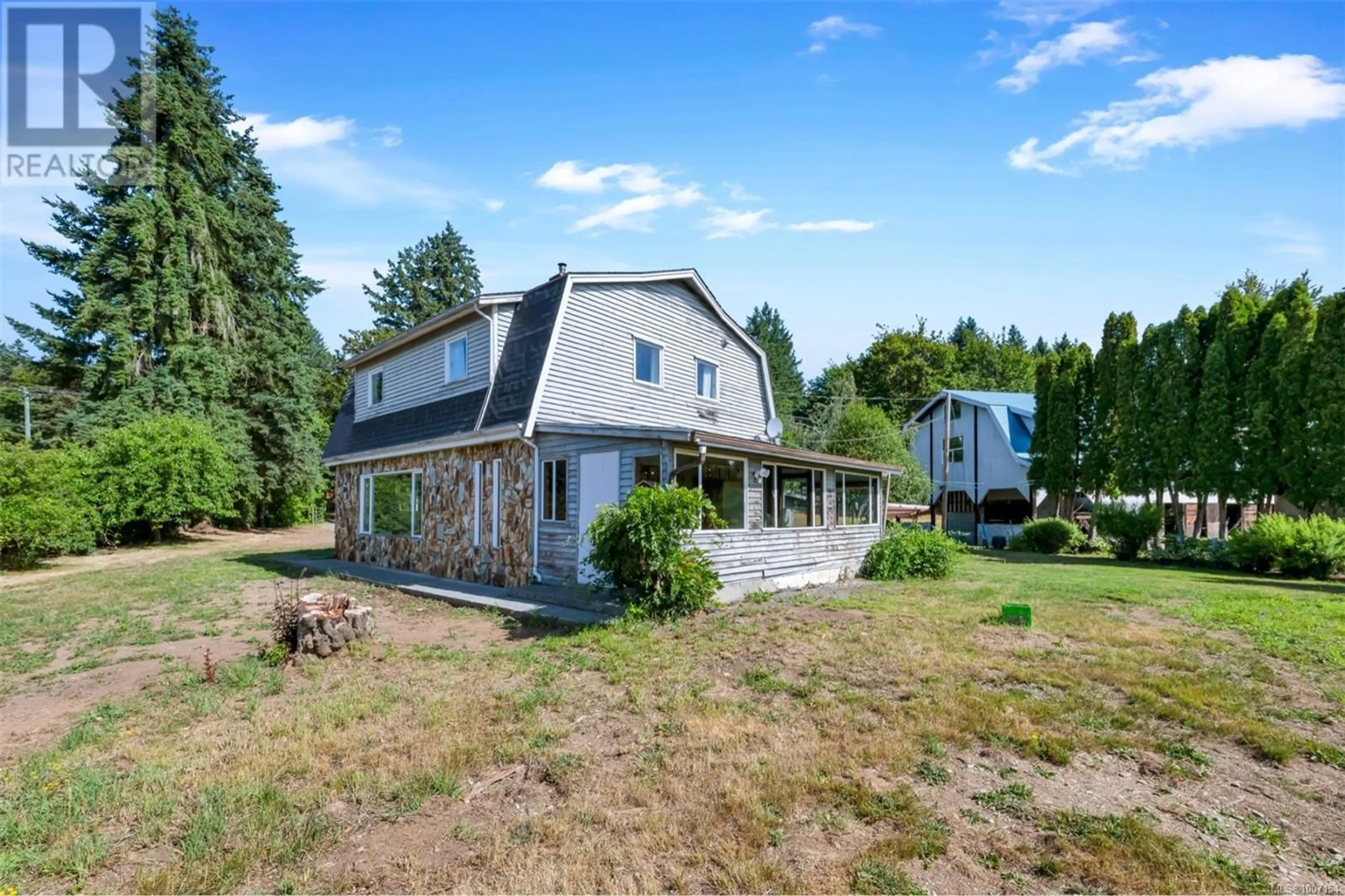 A pic from outside/outdoor area/front of a property/back of a property/a pic from drone, building for 4270 COWICHAN LAKE ROAD, Duncan British Columbia V9L6H2