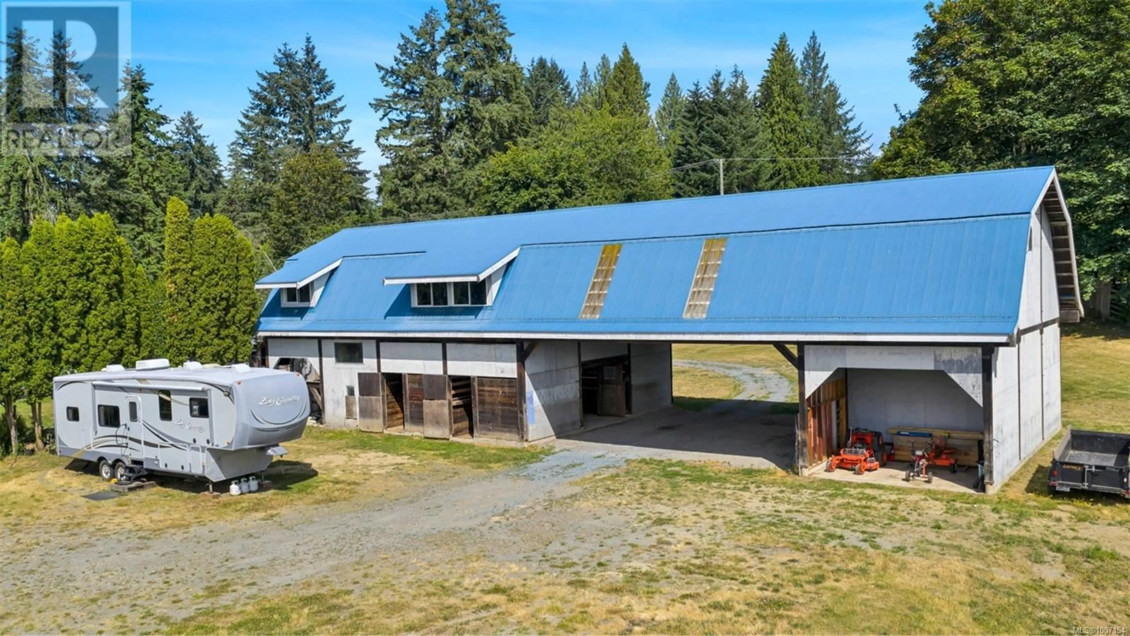 A pic from outside/outdoor area/front of a property/back of a property/a pic from drone, building for 4270 COWICHAN LAKE ROAD, Duncan British Columbia V9L6H2