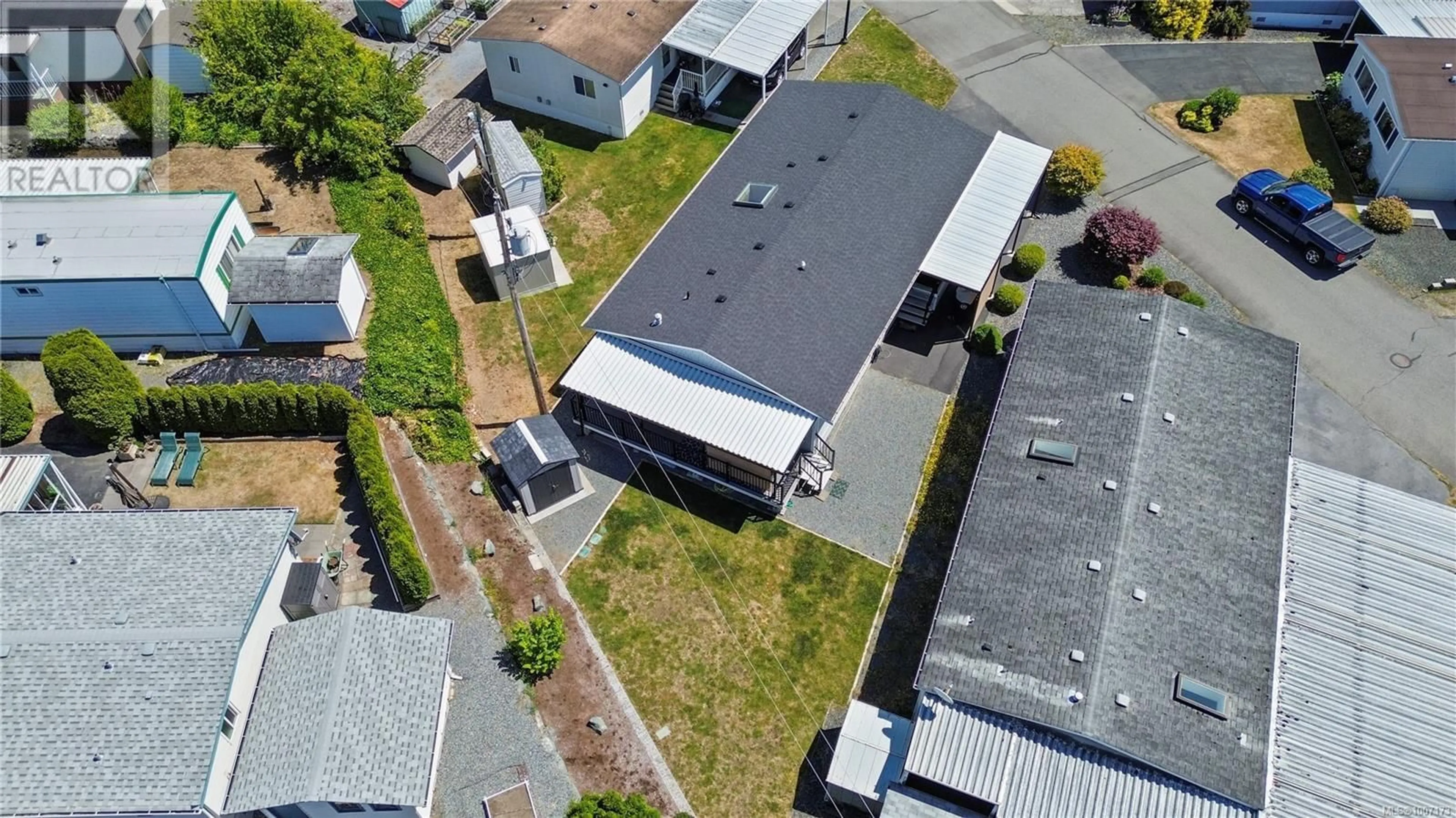A pic from outside/outdoor area/front of a property/back of a property/a pic from drone, street for 61 - 6325 METRAL DRIVE, Nanaimo British Columbia V9T6P9