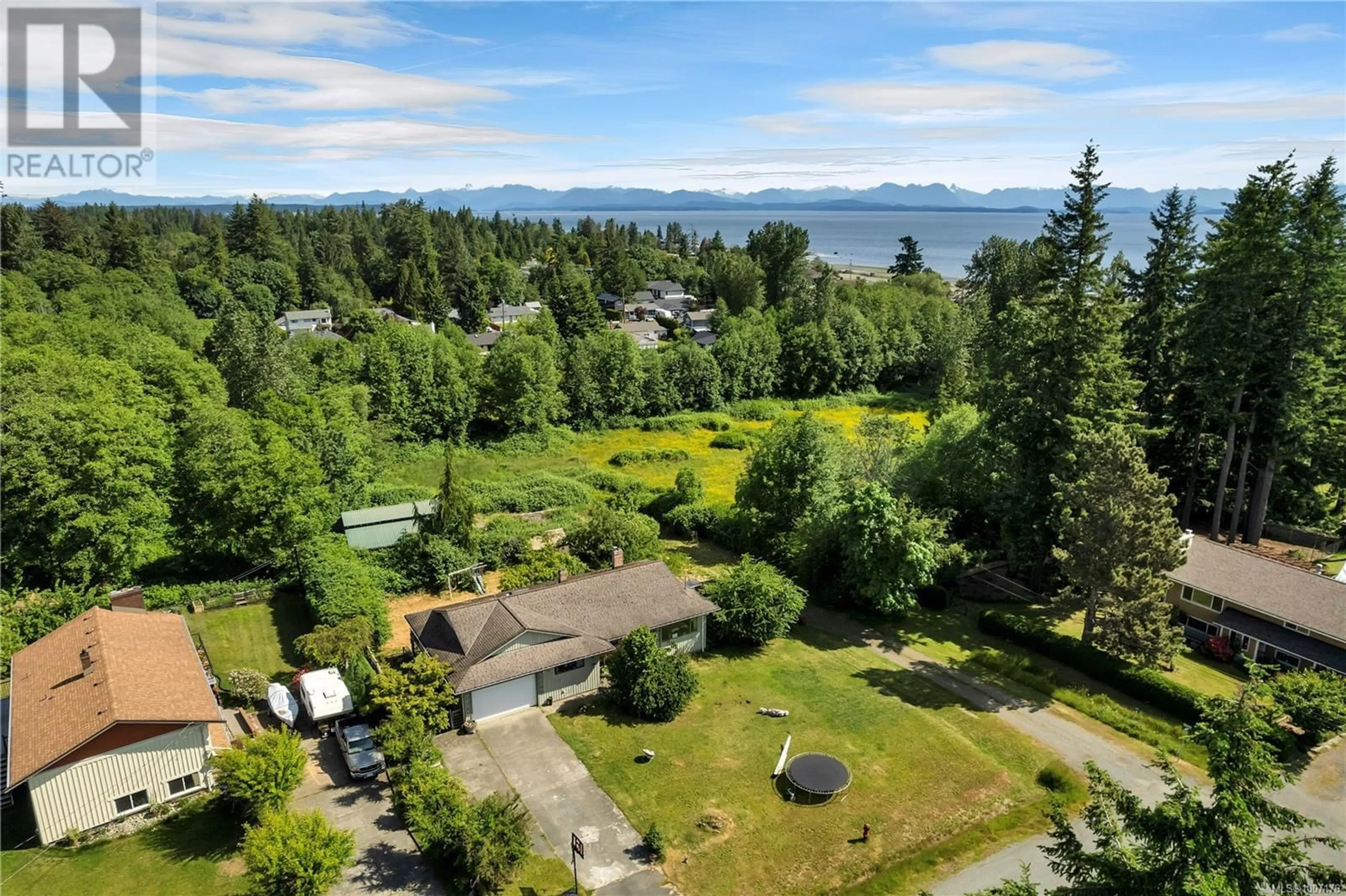 A pic from outside/outdoor area/front of a property/back of a property/a pic from drone, water/lake/river/ocean view for 76 FAIRWINDS ROAD, Campbell River British Columbia V9H1H1