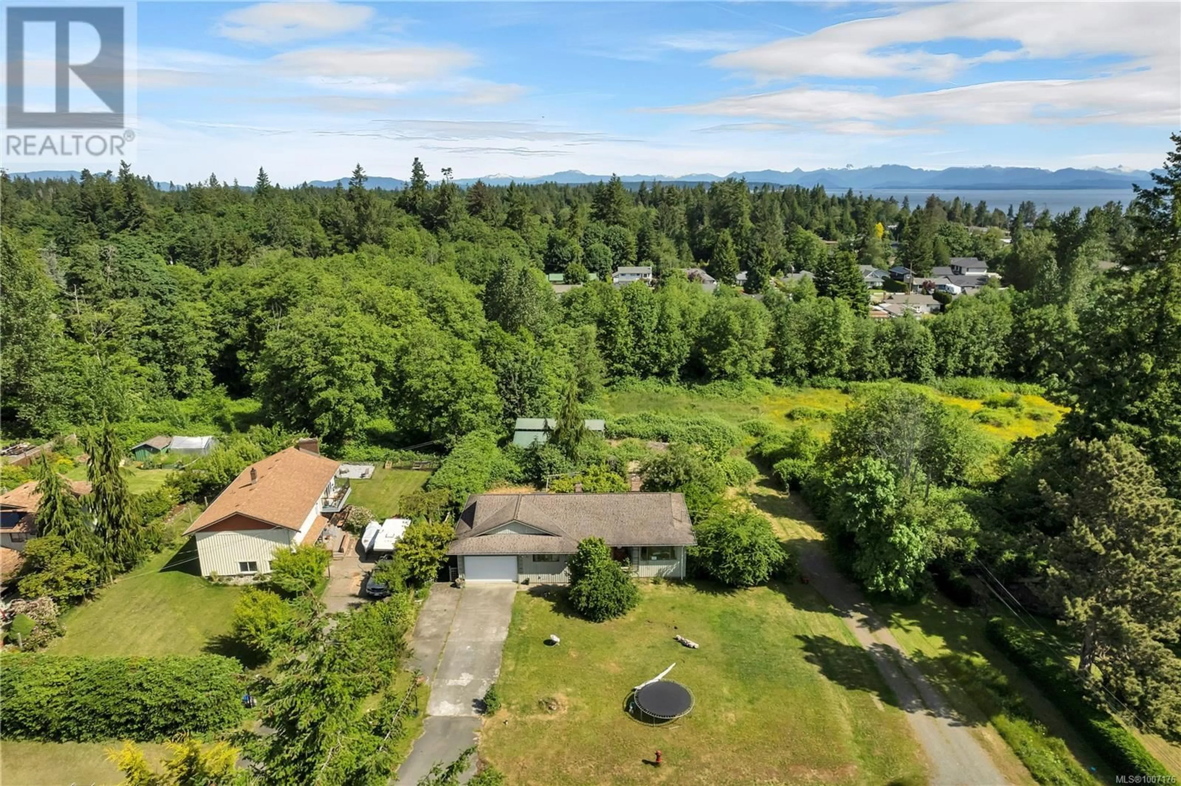 A pic from outside/outdoor area/front of a property/back of a property/a pic from drone, mountain view for 76 FAIRWINDS ROAD, Campbell River British Columbia V9H1H1