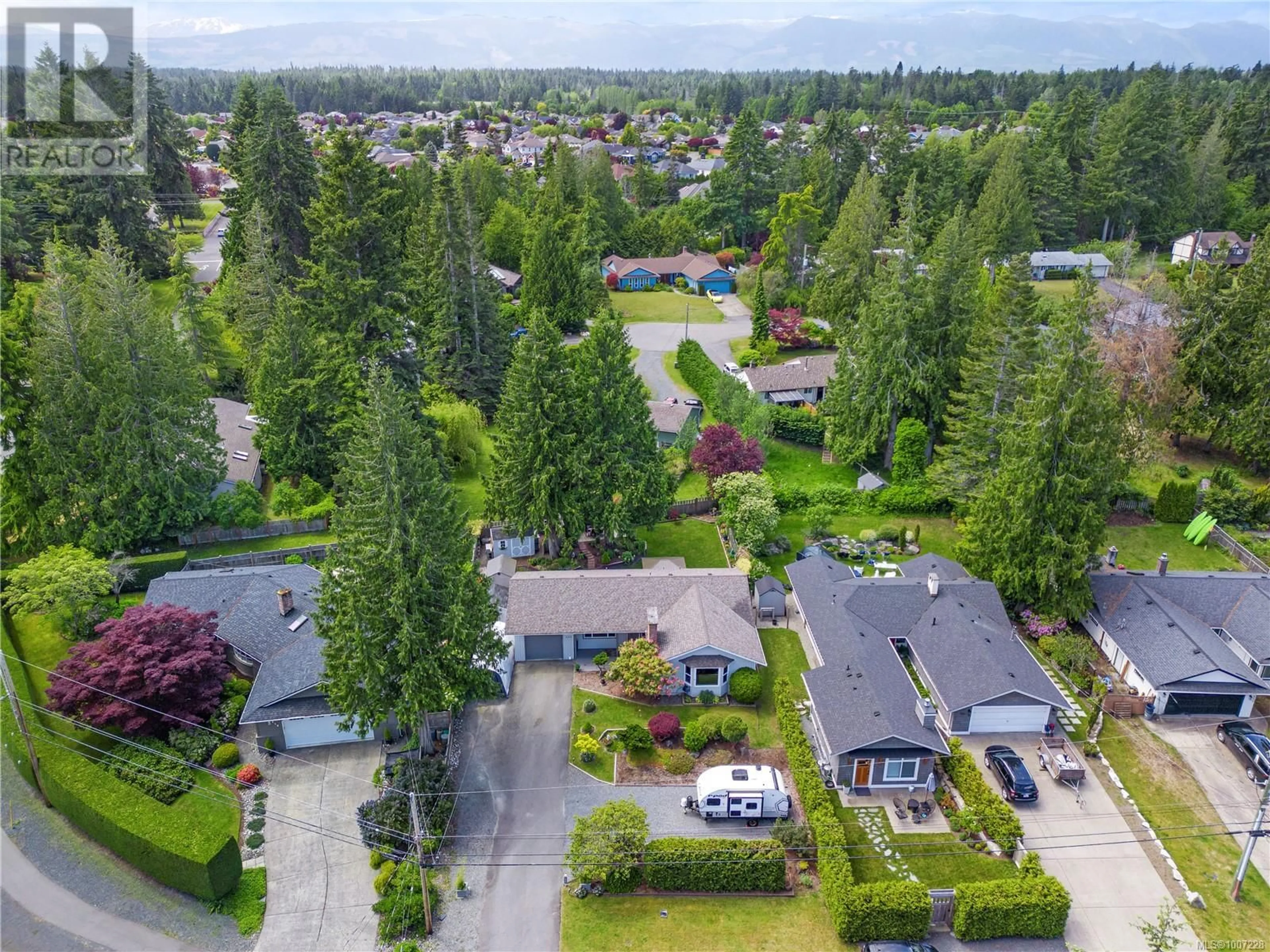 A pic from outside/outdoor area/front of a property/back of a property/a pic from drone, street for 600 EAGLECREST DRIVE, Qualicum Beach British Columbia V9K1E4