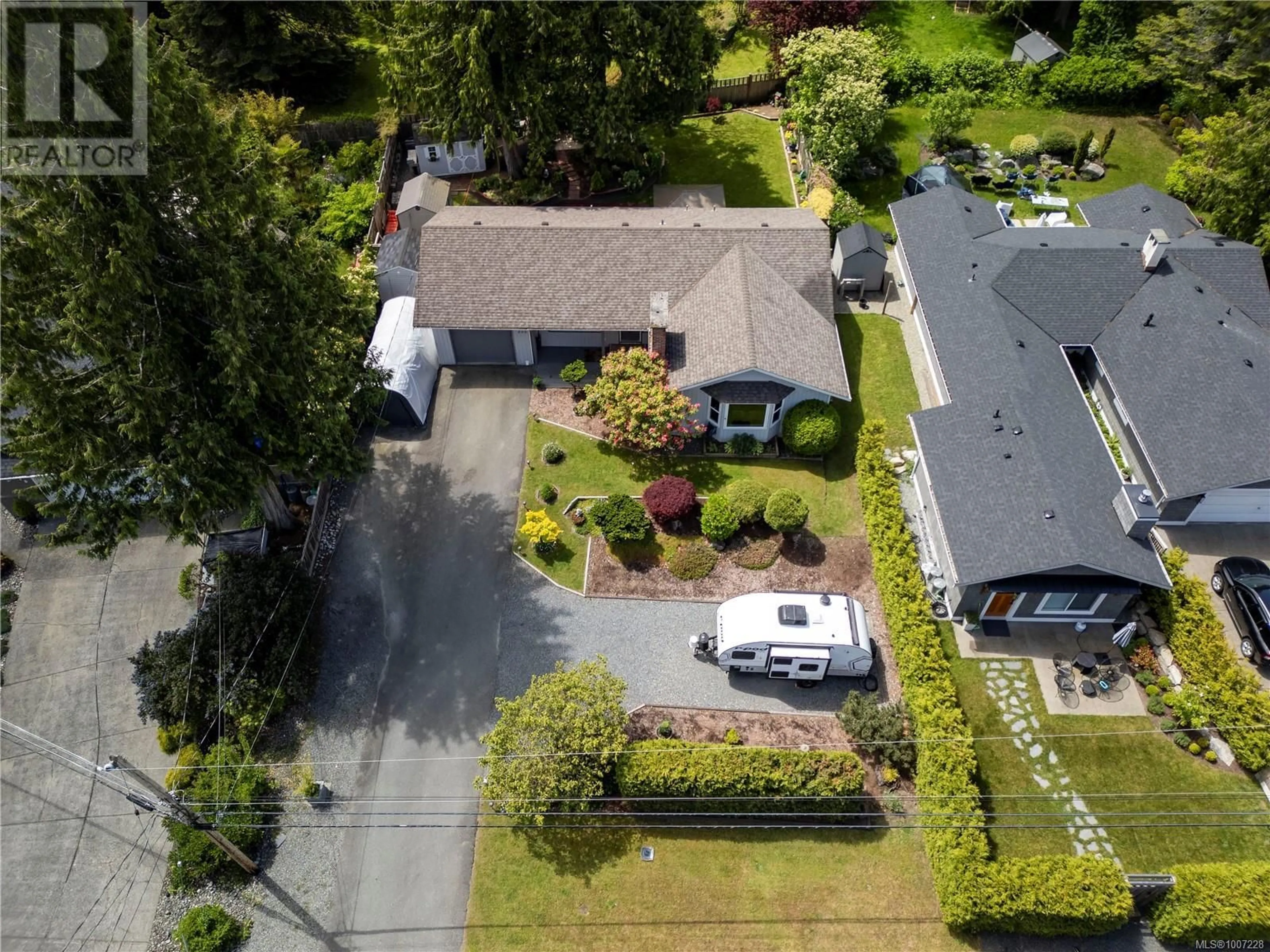 A pic from outside/outdoor area/front of a property/back of a property/a pic from drone, street for 600 EAGLECREST DRIVE, Qualicum Beach British Columbia V9K1E4