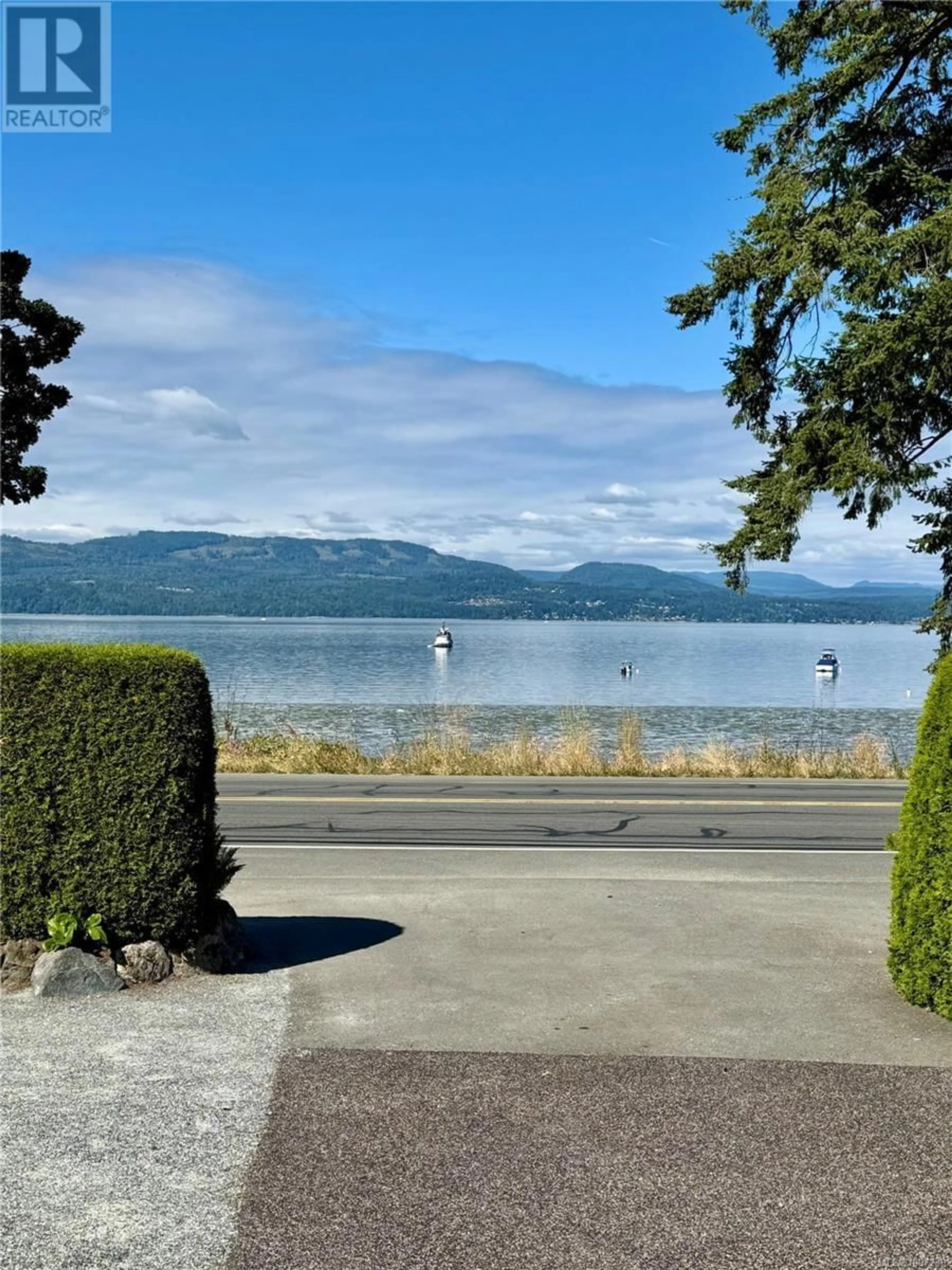 A pic from outside/outdoor area/front of a property/back of a property/a pic from drone, water/lake/river/ocean view for 10189 WEST SAANICH ROAD, North Saanich British Columbia V8L5T6