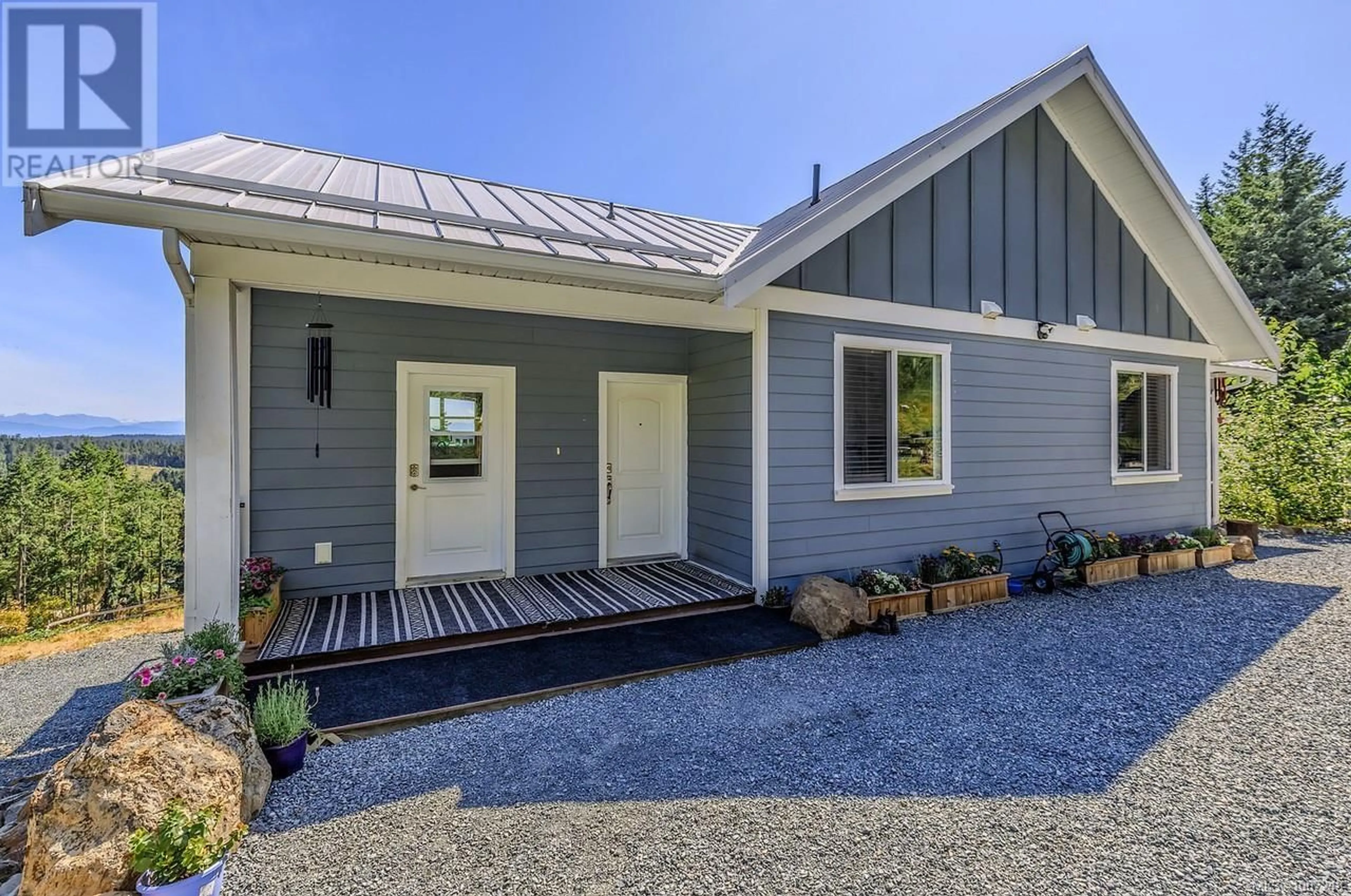 Home with vinyl exterior material, street for 1860 MORELLO ROAD, Nanoose Bay British Columbia V9P9B1