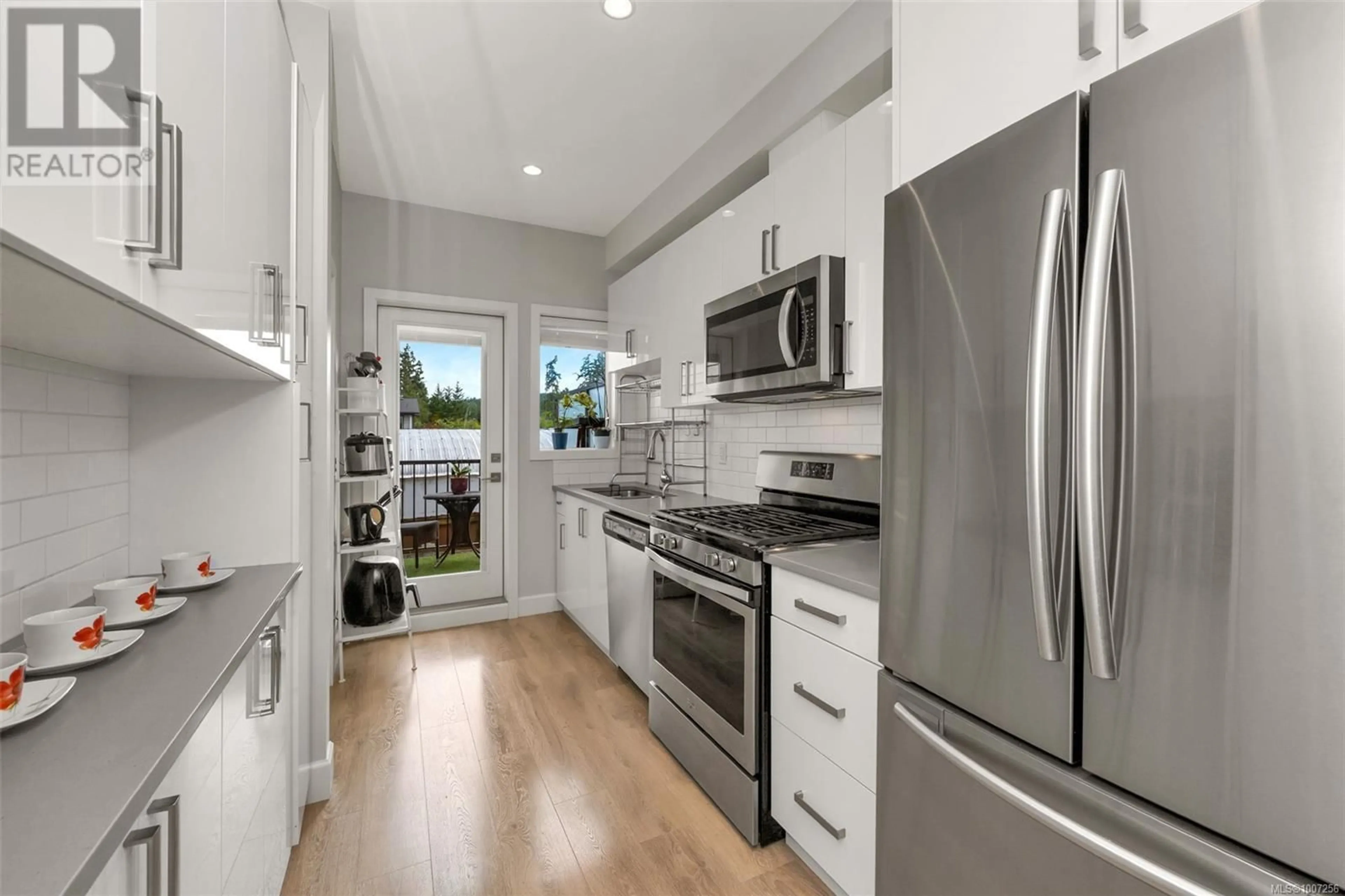 Open concept kitchen, unknown for 403 - 3351 LUXTON ROAD, Langford British Columbia V9C0P2