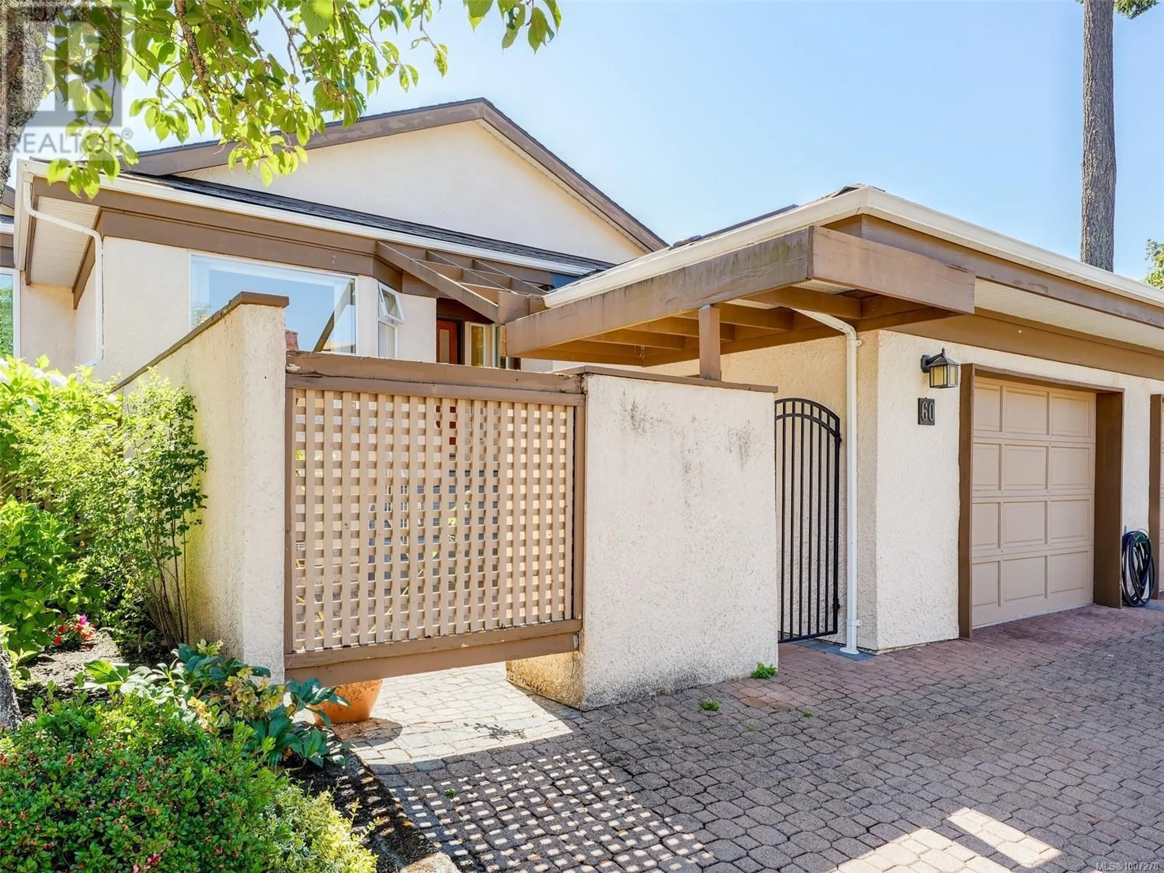 Home with brick exterior material, street for 60 - 901 KENTWOOD LANE, Saanich British Columbia V8Y2Y9