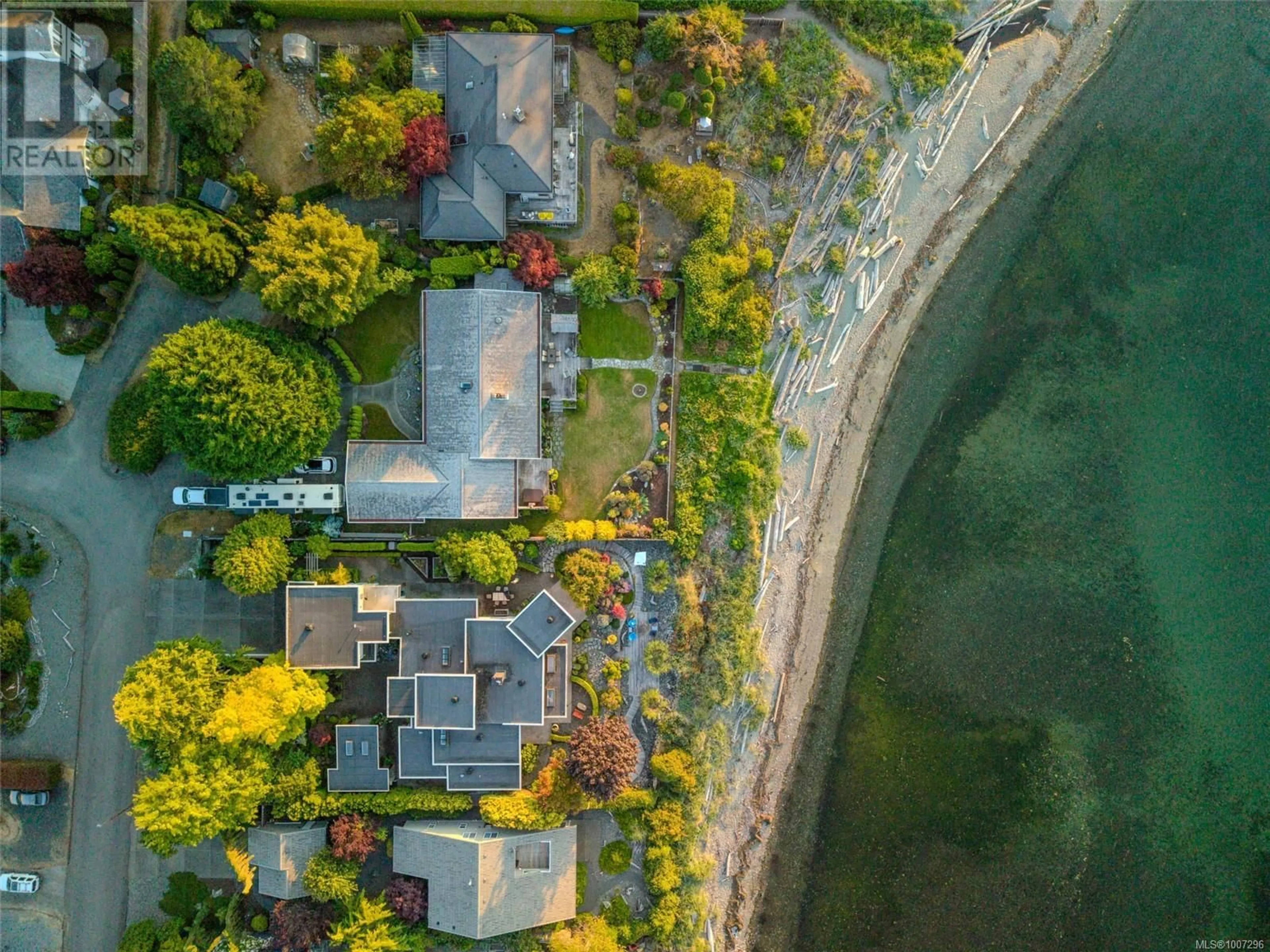 A pic from outside/outdoor area/front of a property/back of a property/a pic from drone, water/lake/river/ocean view for 1489 ADMIRAL TRYON BOULEVARD, Parksville British Columbia V9P1Y3