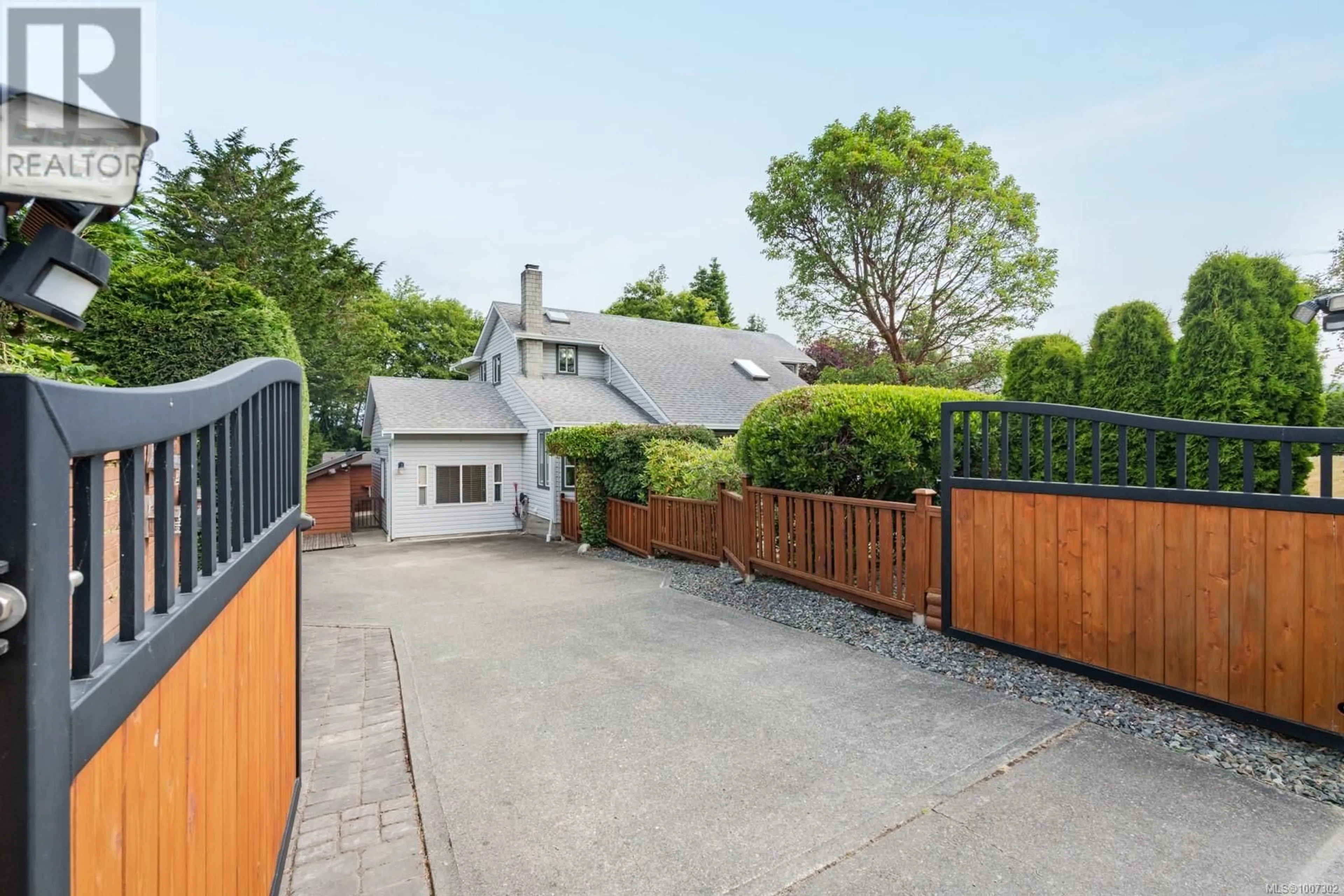 A pic from outside/outdoor area/front of a property/back of a property/a pic from drone, street for 1571 WHIFFIN SPIT ROAD, Sooke British Columbia V9Z0T4