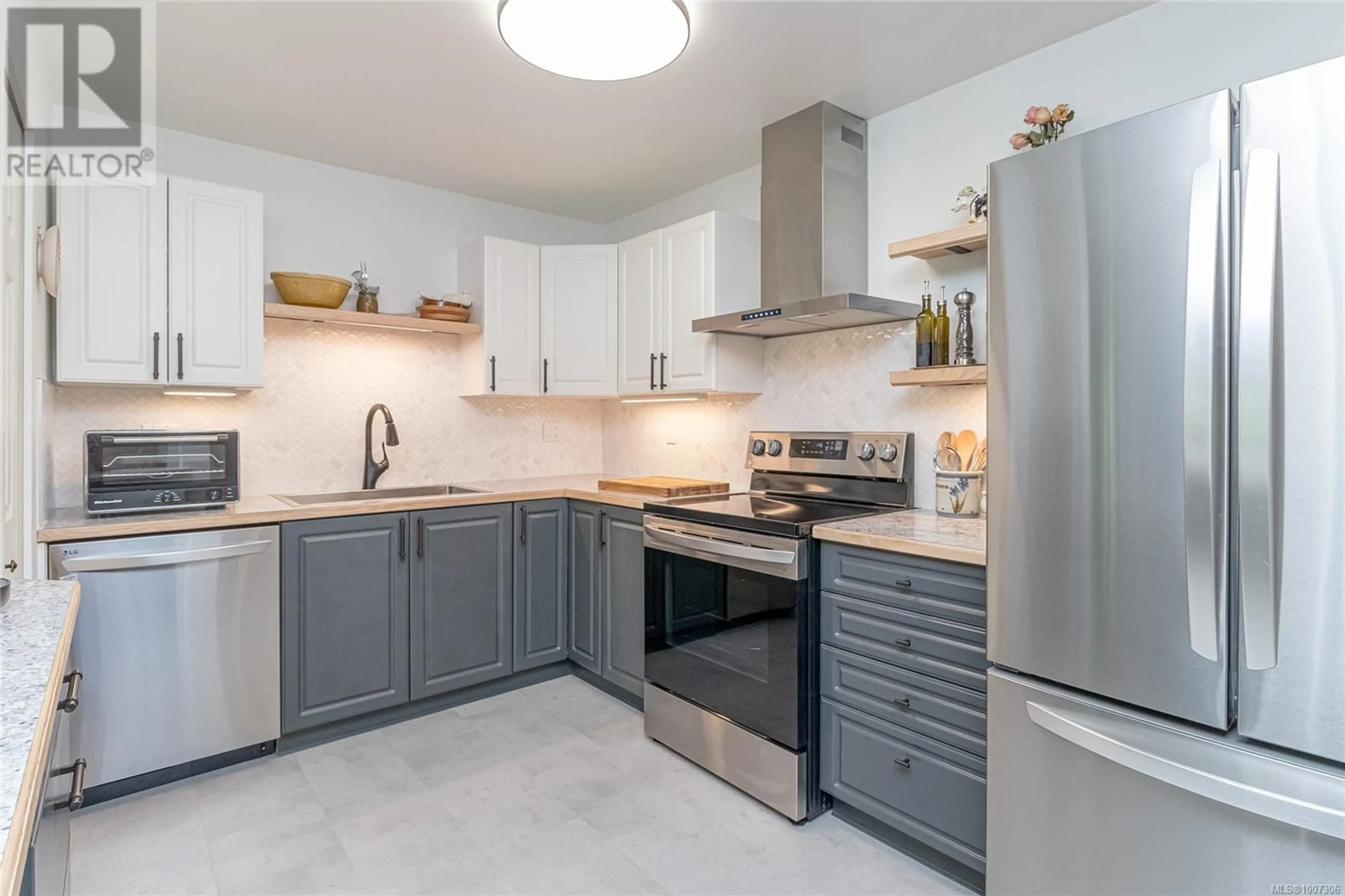 Open concept kitchen, ceramic/tile floor for 311 - 5620 EDGEWATER LANE, Nanaimo British Columbia V9T5K1