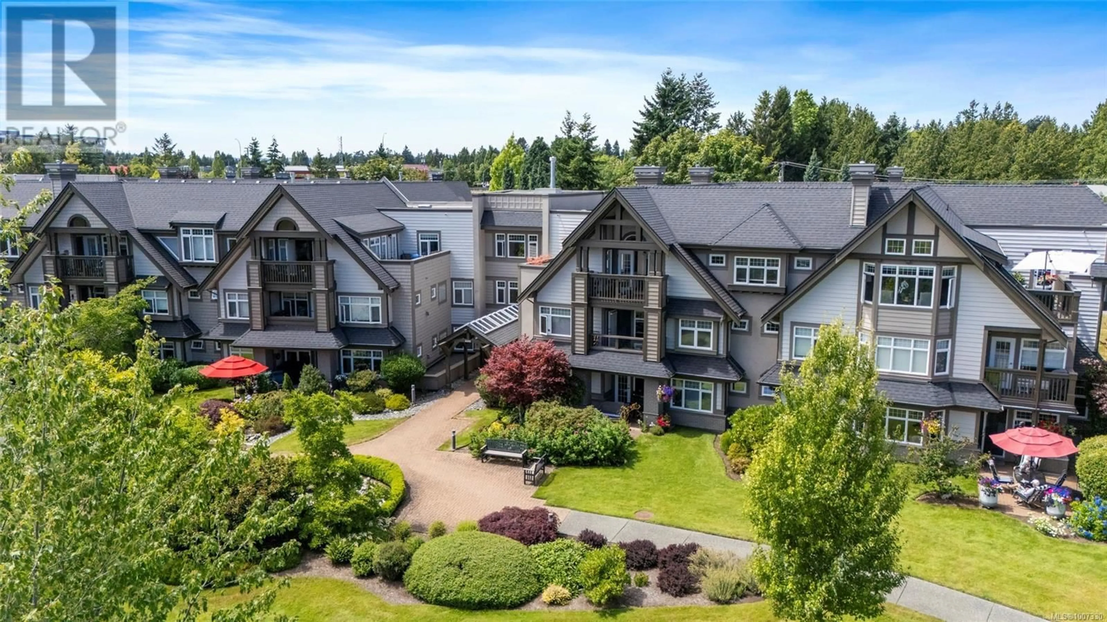 A pic from outside/outdoor area/front of a property/back of a property/a pic from drone, mountain view for 124 - 4490 CHATTERTON WAY, Saanich British Columbia V8X4Y7