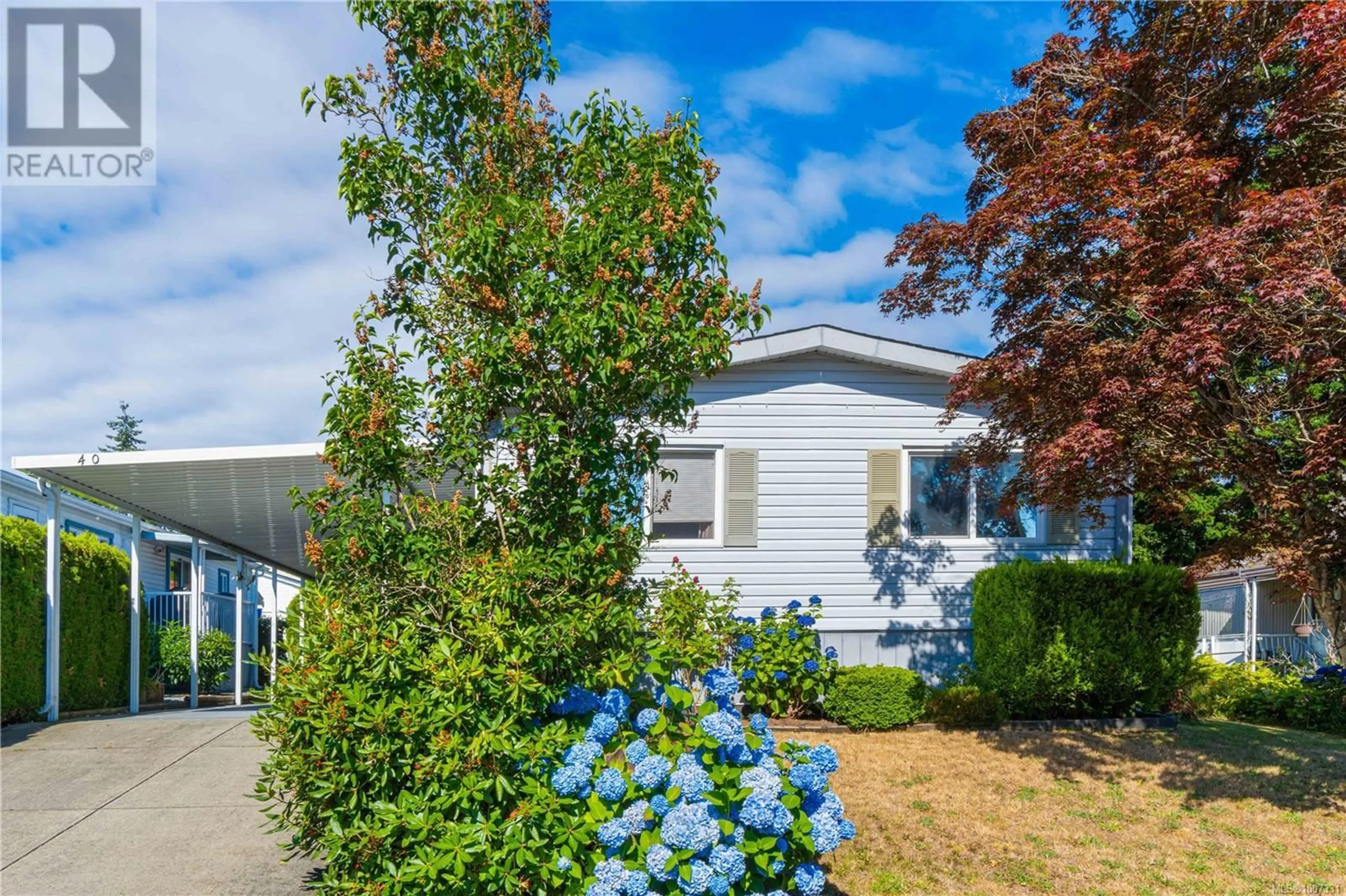 Home with vinyl exterior material, street for 40 - 2501 LABIEUX ROAD, Nanaimo British Columbia V9T5A6