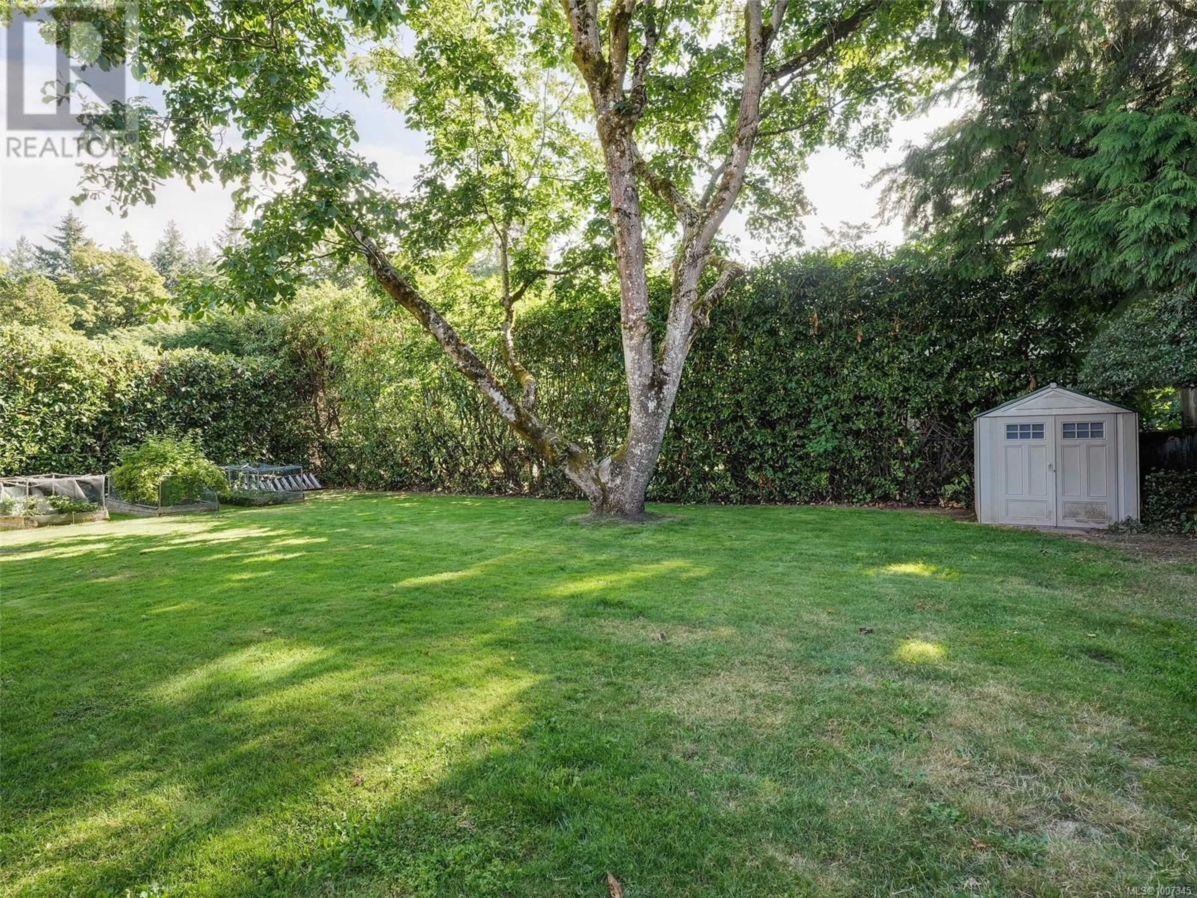 A pic from outside/outdoor area/front of a property/back of a property/a pic from drone, forest/trees view for 5133 SANTA CLARA AVENUE, Saanich British Columbia V8Y1W5