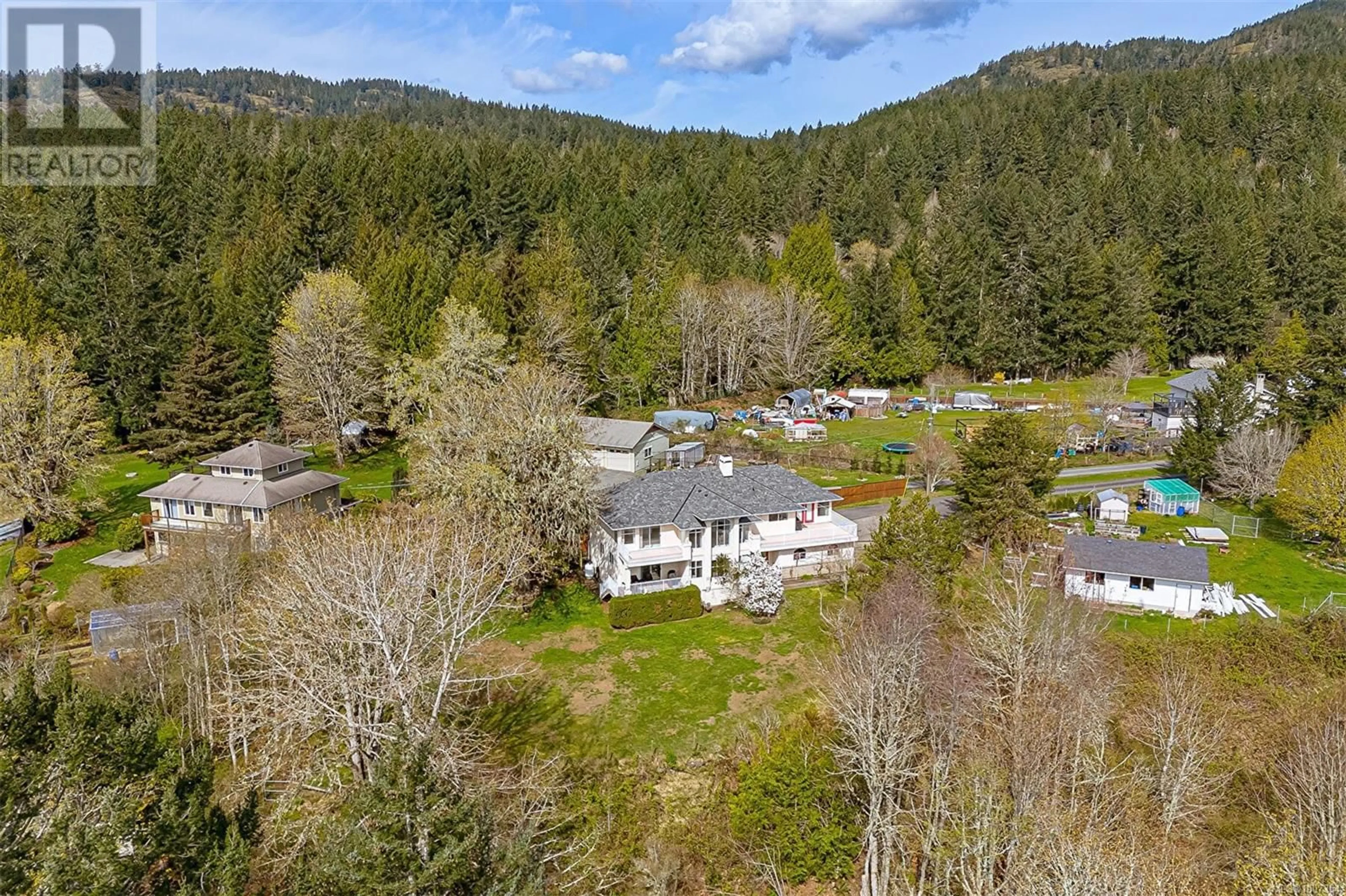 A pic from outside/outdoor area/front of a property/back of a property/a pic from drone, forest/trees view for 2212 AYUM ROAD, Sooke British Columbia V9Z0E7