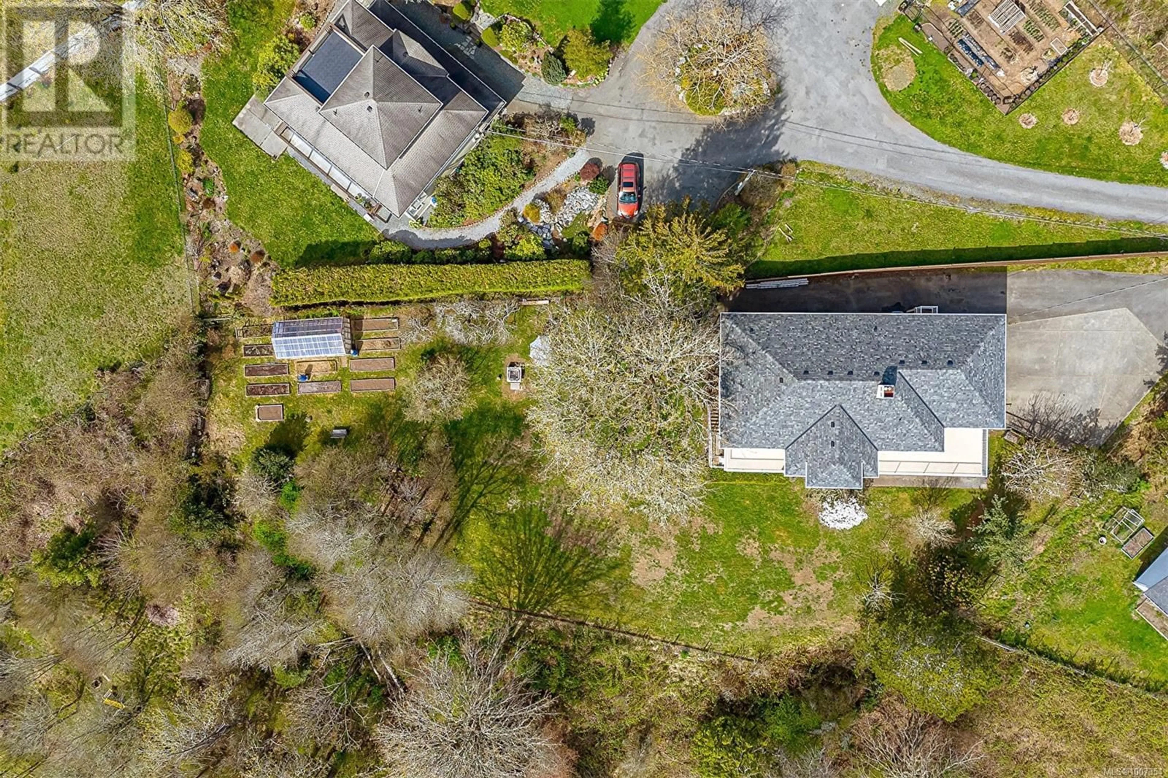 A pic from outside/outdoor area/front of a property/back of a property/a pic from drone, street for 2212 AYUM ROAD, Sooke British Columbia V9Z0E7