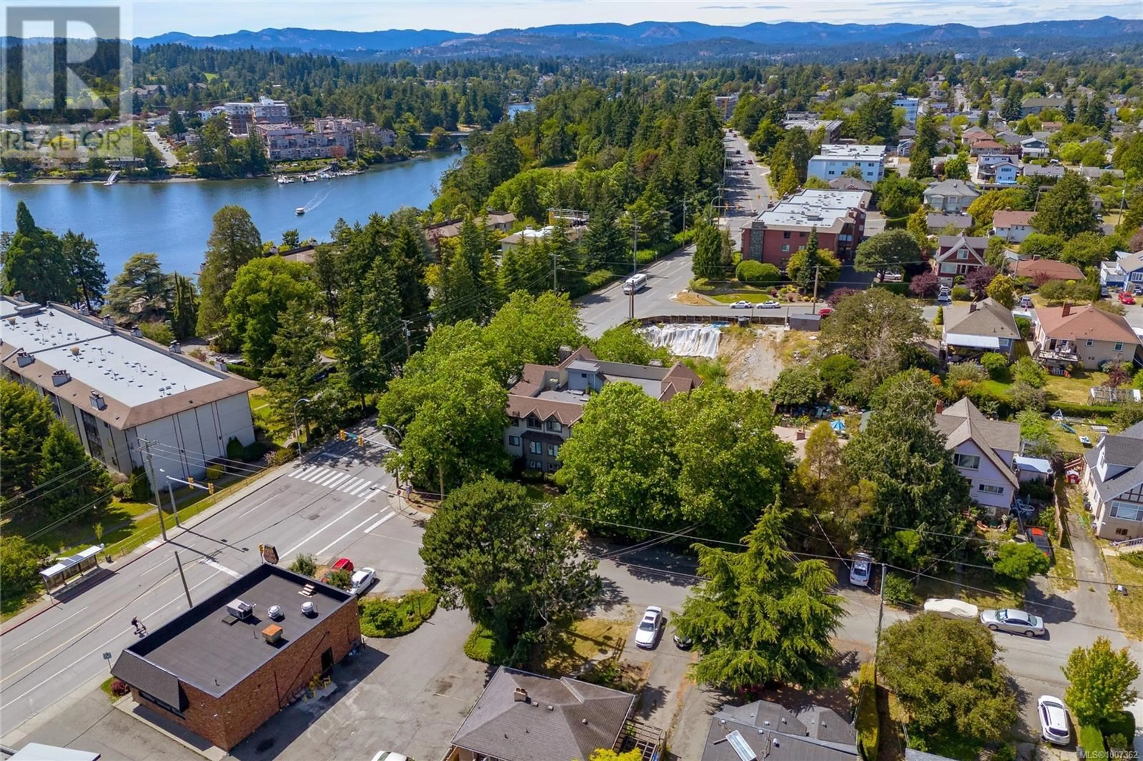 A pic from outside/outdoor area/front of a property/back of a property/a pic from drone, water/lake/river/ocean view for 301 - 108 GORGE ROAD WEST, Saanich British Columbia V9A1M2