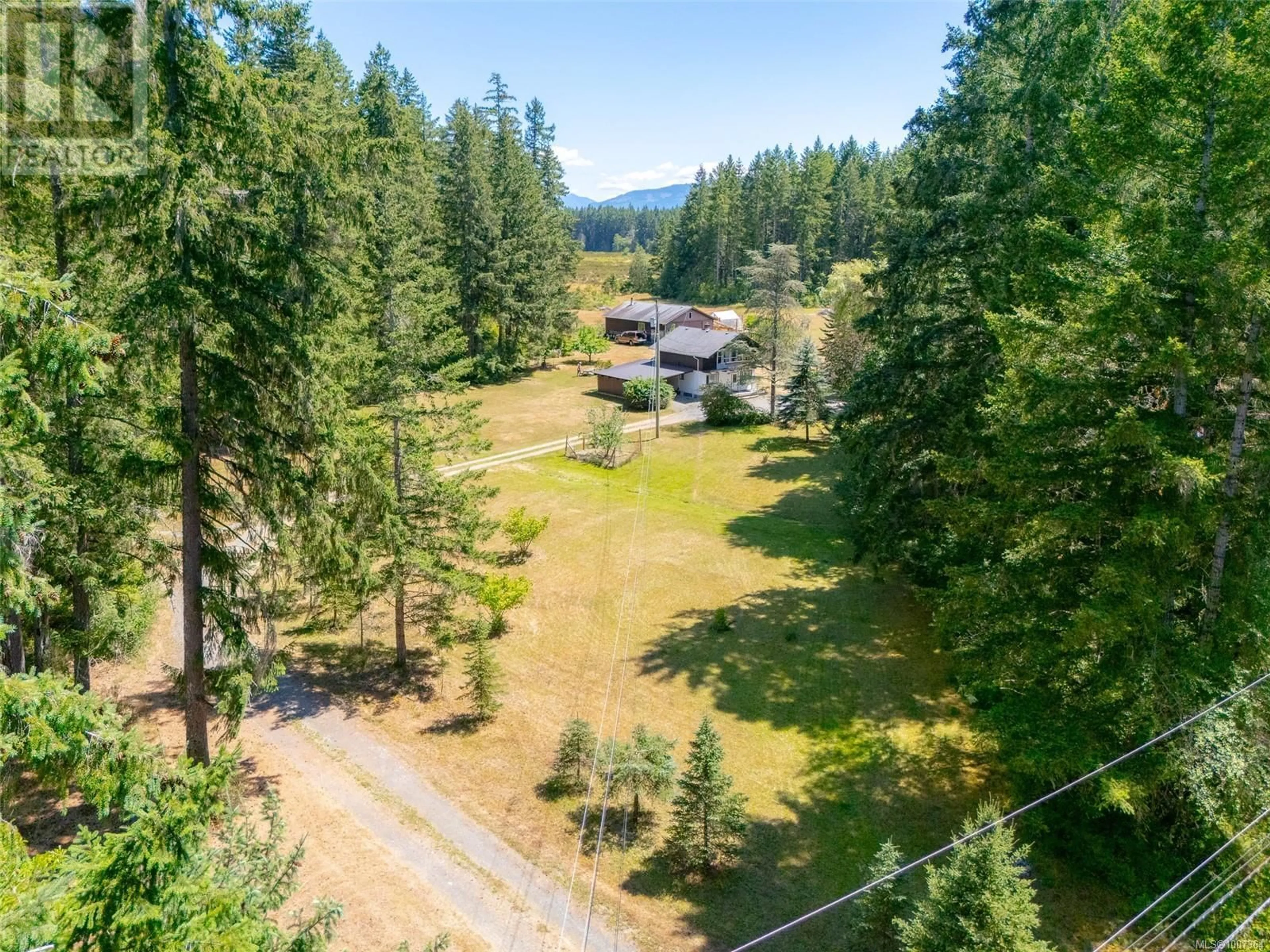 A pic from outside/outdoor area/front of a property/back of a property/a pic from drone, forest/trees view for 7175 THOMPSON ROAD, Port Alberni British Columbia V9Y8M3