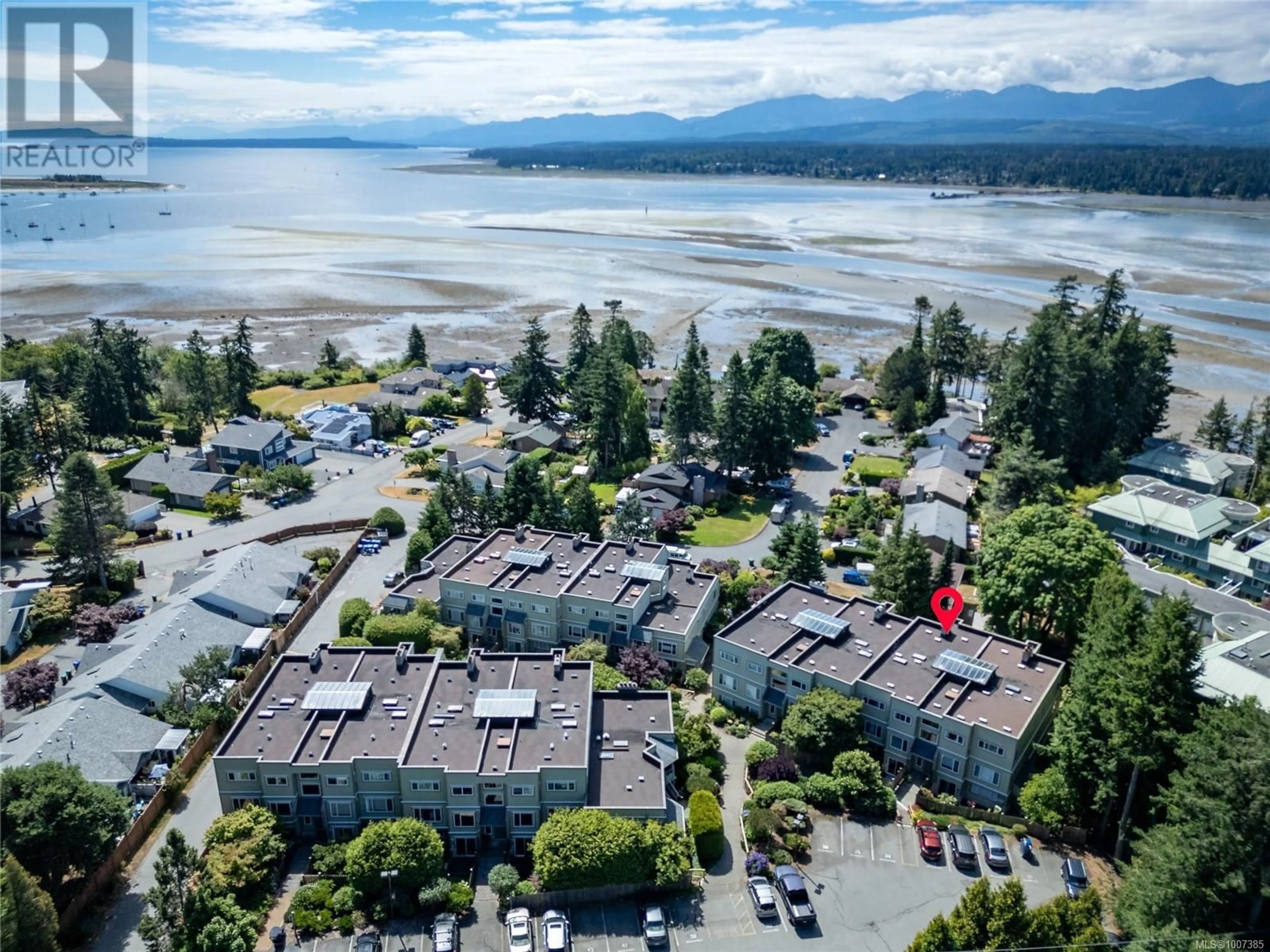 A pic from outside/outdoor area/front of a property/back of a property/a pic from drone, water/lake/river/ocean view for 308C - 2250 MANOR PLACE, Comox British Columbia V9M1C5