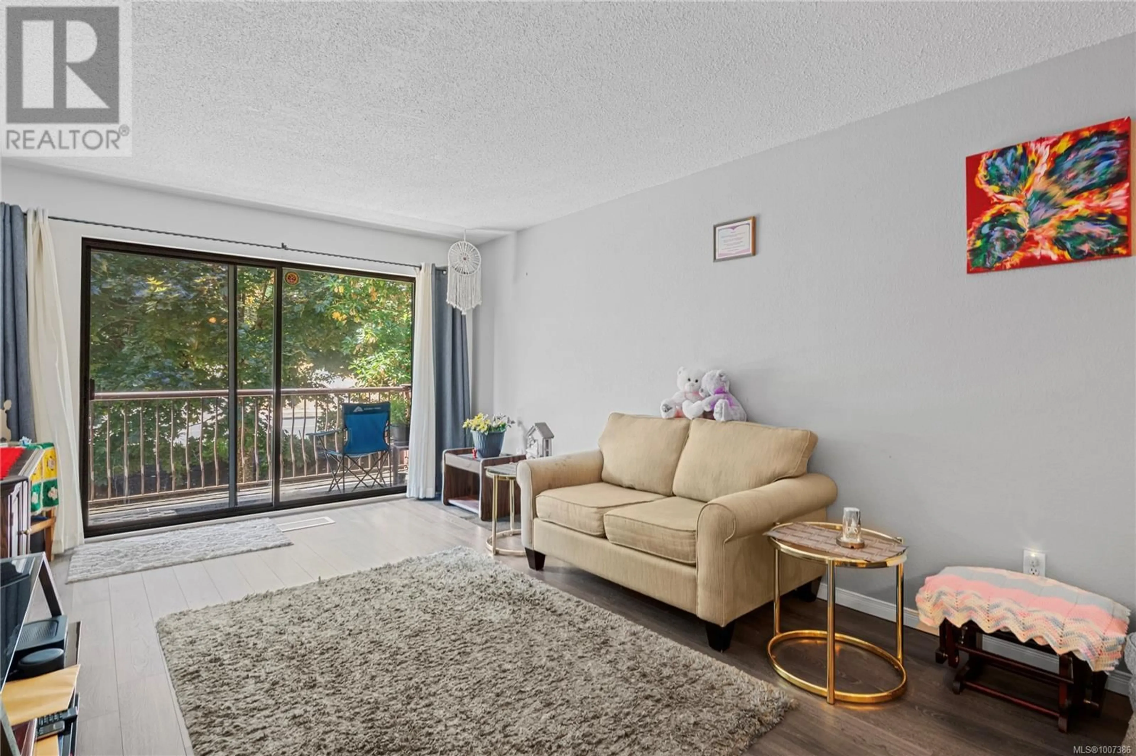 Living room with furniture, unknown for 319 - 1600 DUFFERIN CRESCENT, Nanaimo British Columbia V9S5N2