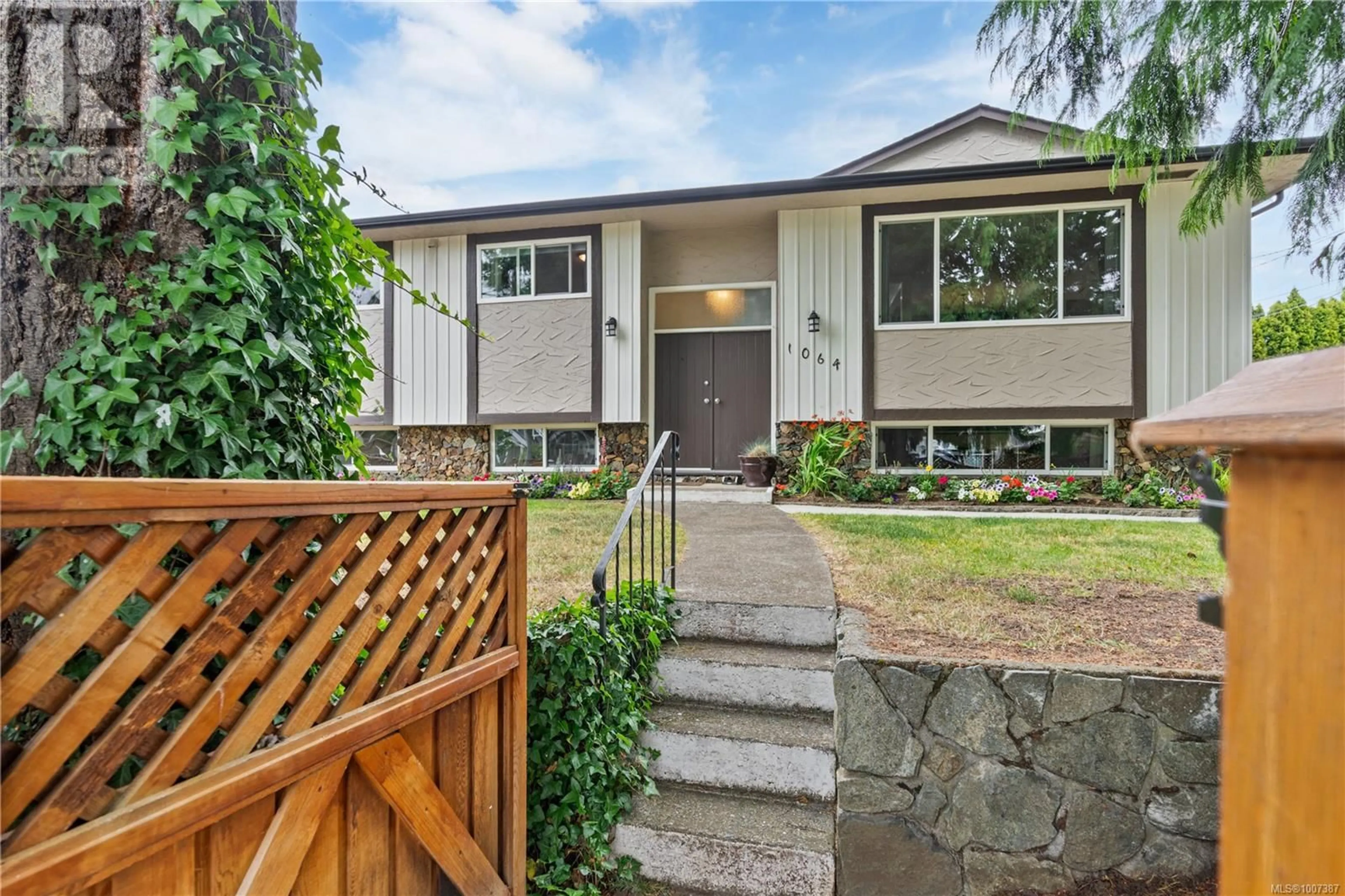 Home with vinyl exterior material, street for 1064 VERDIER AVENUE, Central Saanich British Columbia V8M1E6