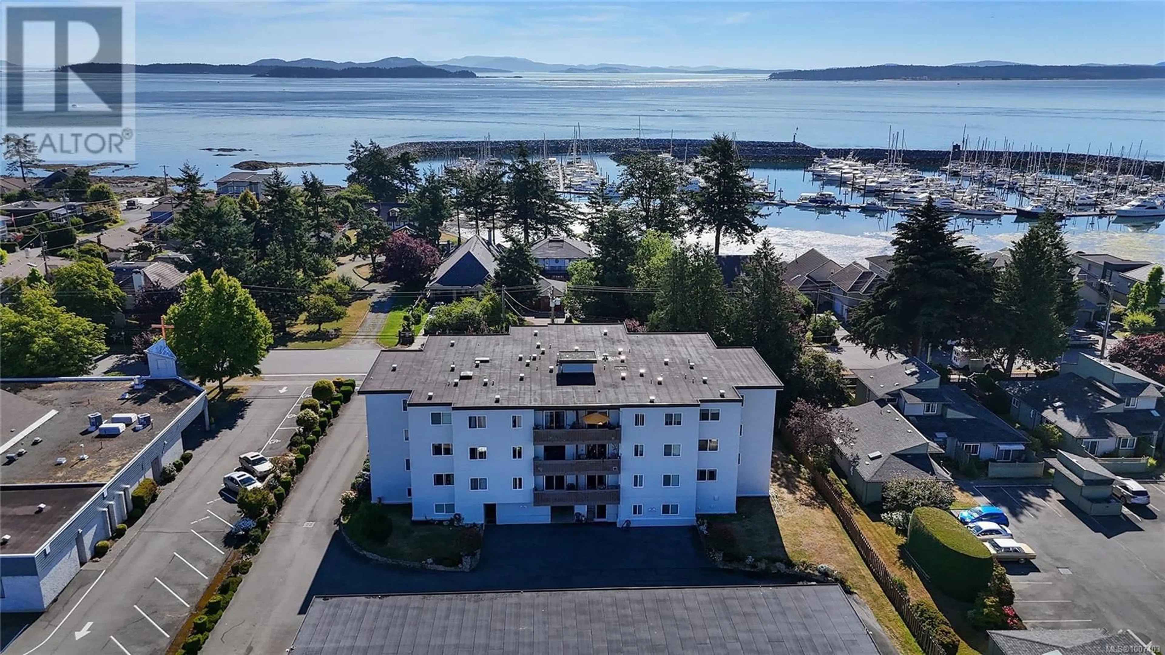 A pic from outside/outdoor area/front of a property/back of a property/a pic from drone, water/lake/river/ocean view for 306 - 10016 THIRD STREET, Sidney British Columbia V8L3B3