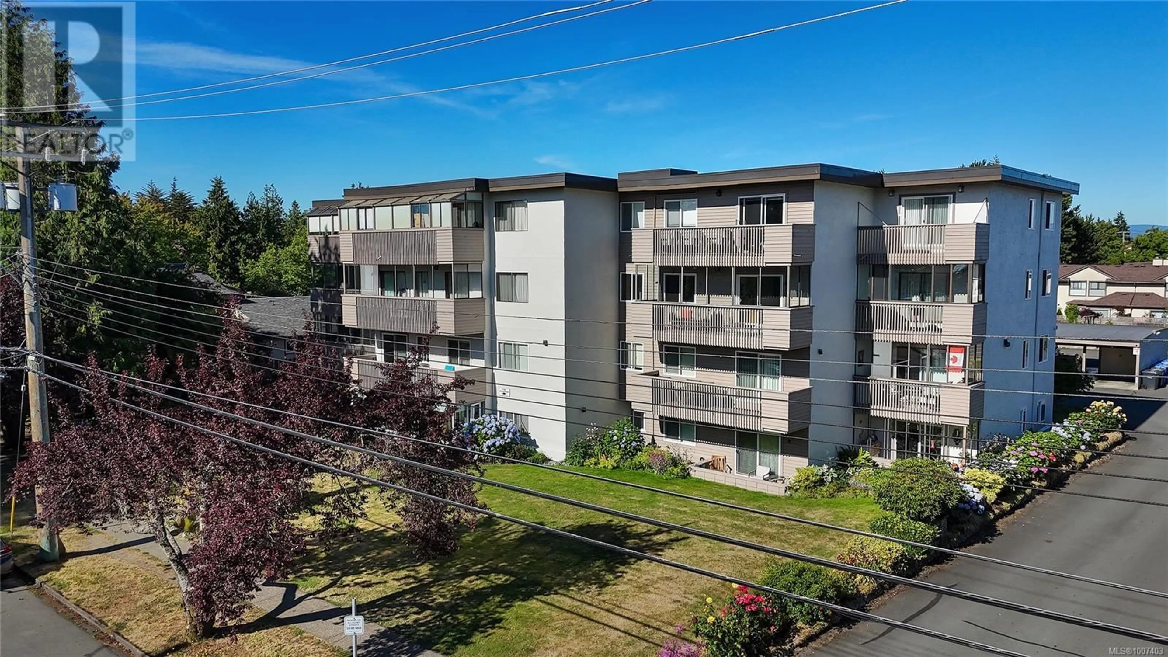 A pic from outside/outdoor area/front of a property/back of a property/a pic from drone, building for 306 - 10016 THIRD STREET, Sidney British Columbia V8L3B3