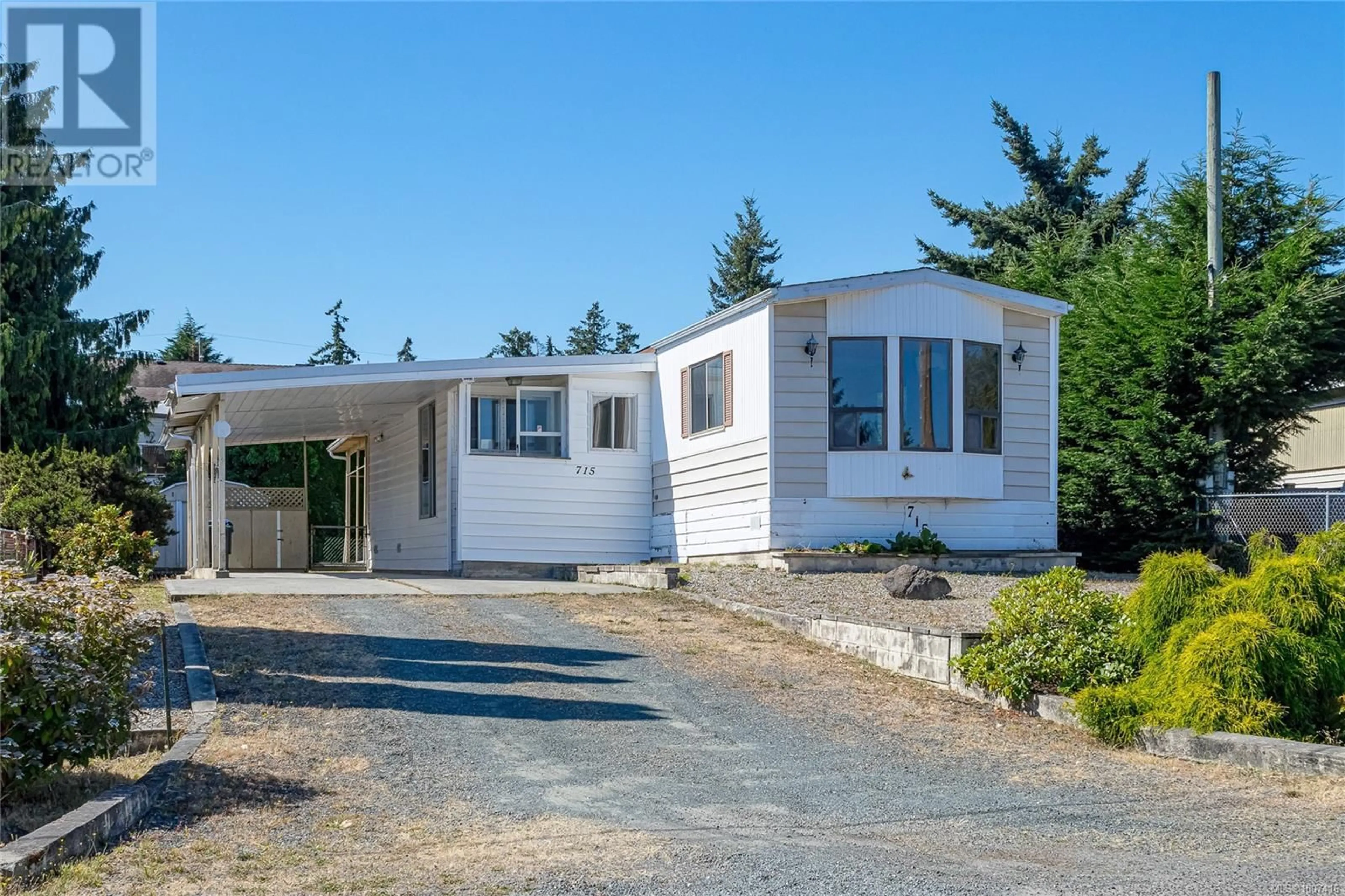 Home with vinyl exterior material, street for 715 KASBA CIRCLE, Parksville British Columbia V9P2A7
