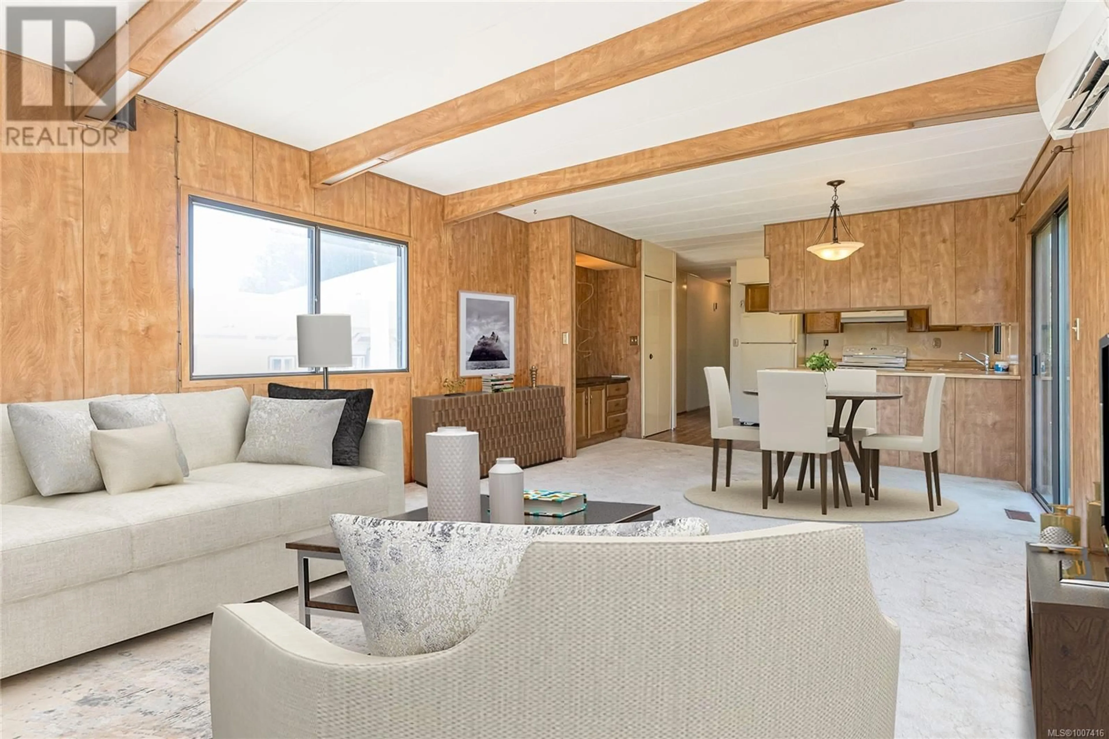 Living room with furniture, wood/laminate floor for 715 KASBA CIRCLE, Parksville British Columbia V9P2A7
