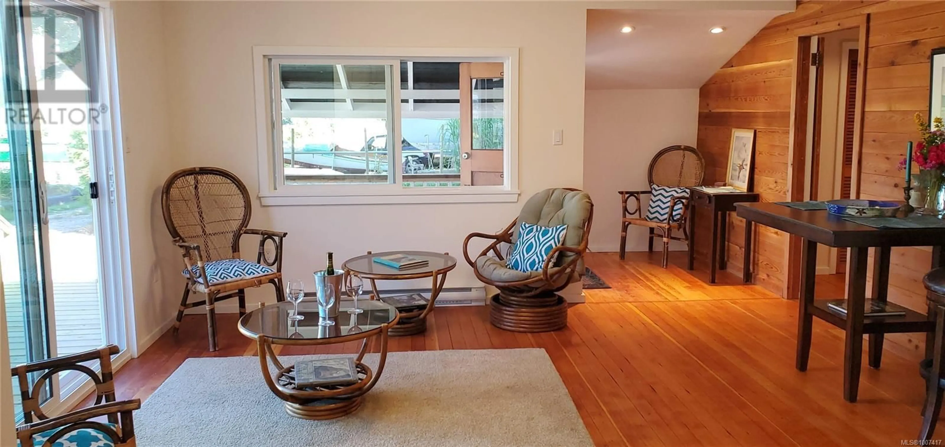 Living room with furniture, wood/laminate floor for 683 GREEN ROAD, Quadra Island British Columbia V0P1N0