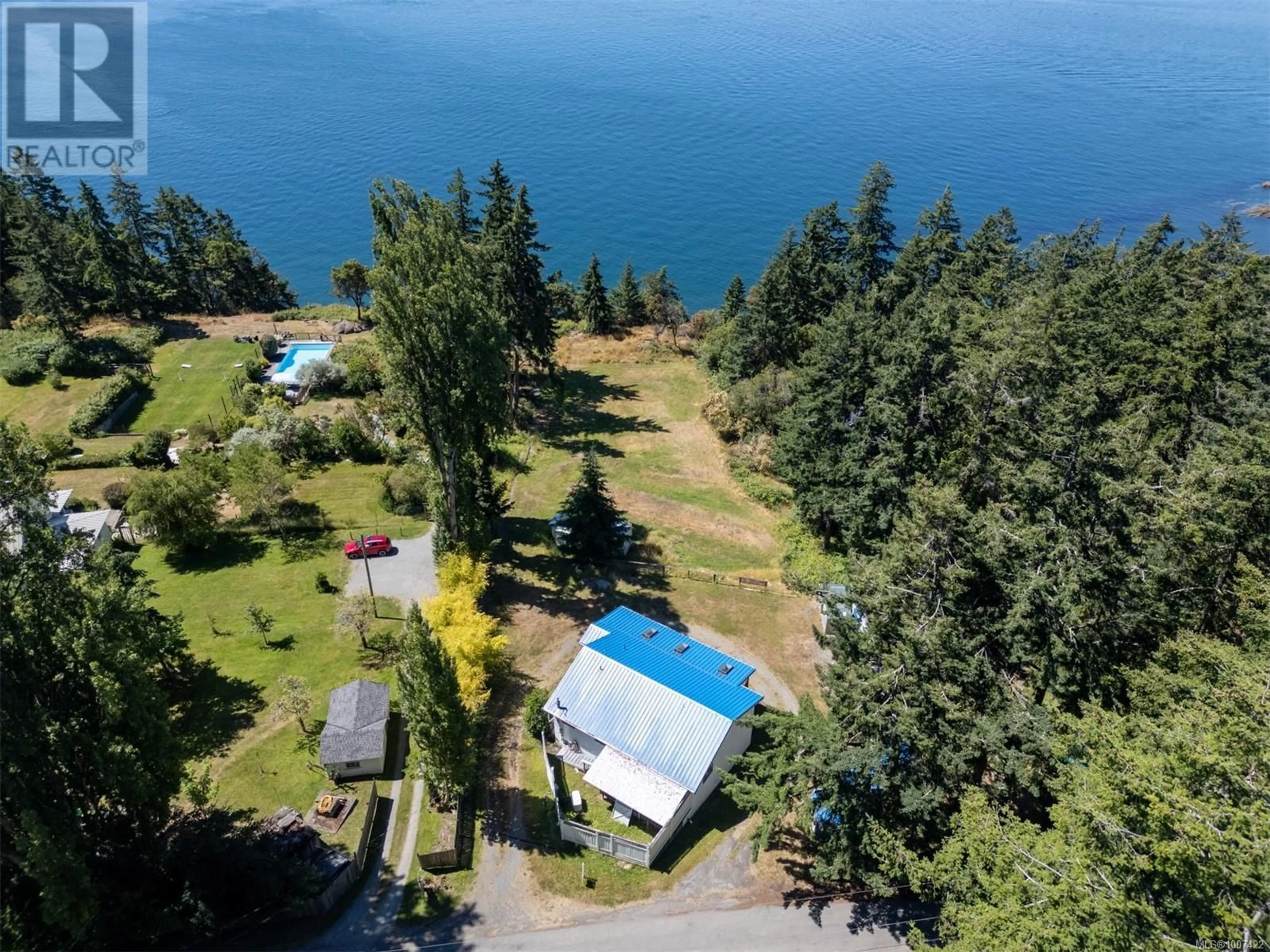 A pic from outside/outdoor area/front of a property/back of a property/a pic from drone, water/lake/river/ocean view for 1325 MACKINNON ROAD, Pender Island British Columbia V0N2M1