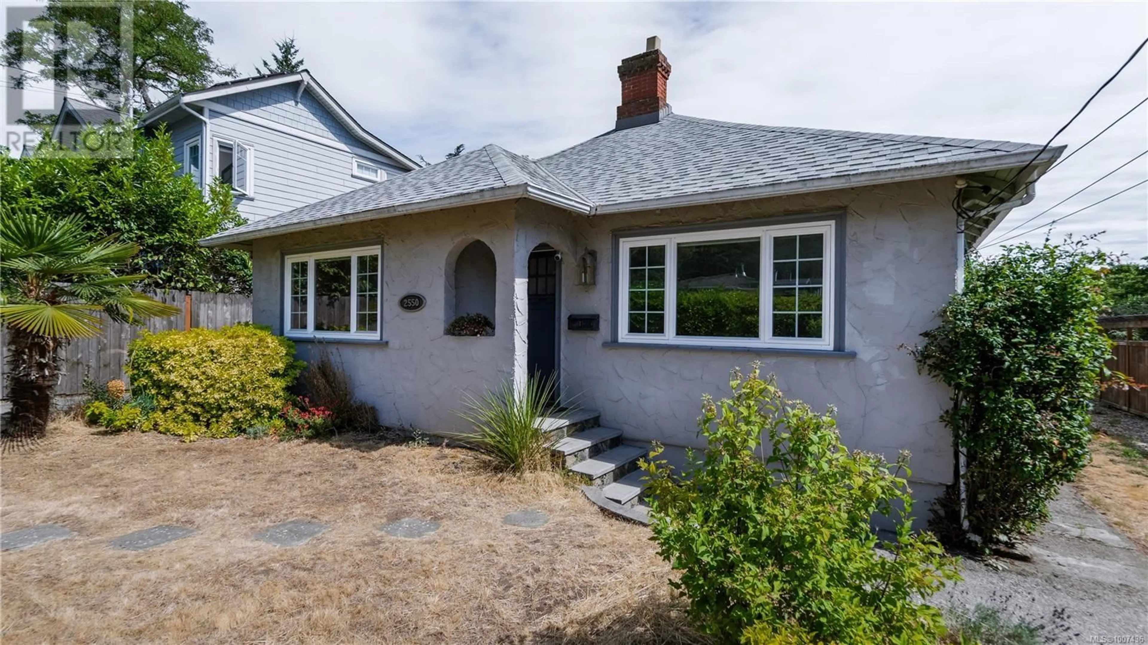 Home with brick exterior material, street for 2550 SINCLAIR ROAD, Saanich British Columbia V8N1B8